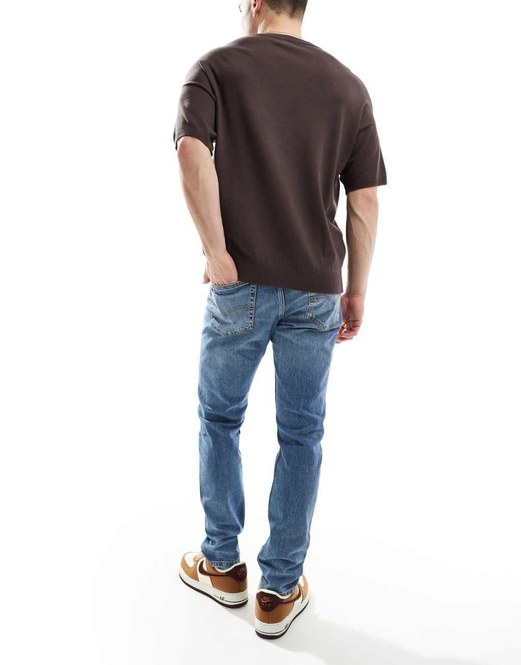 Levi's 515 slim fit jeans in mid blue Product Image