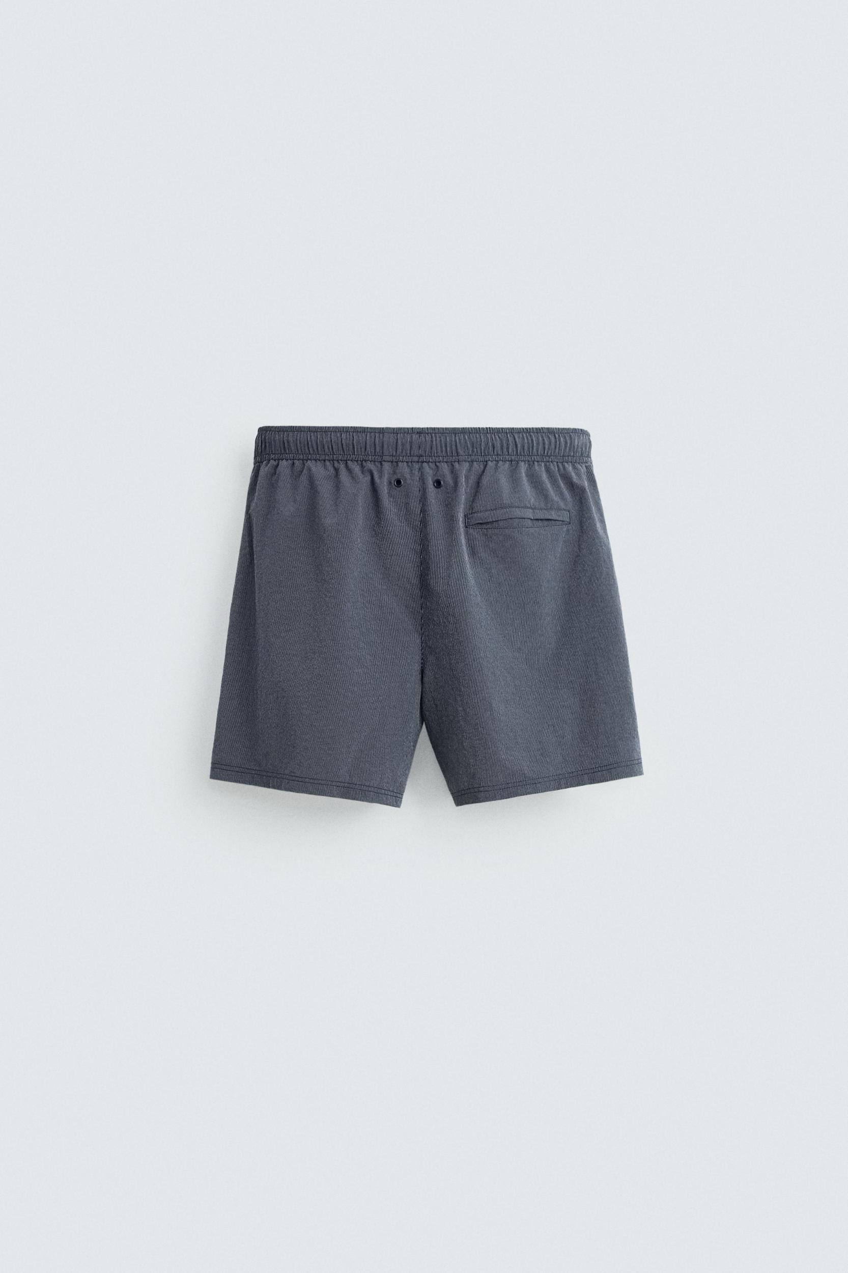 STRIPED MID-LENGTH SWIMSUIT Product Image