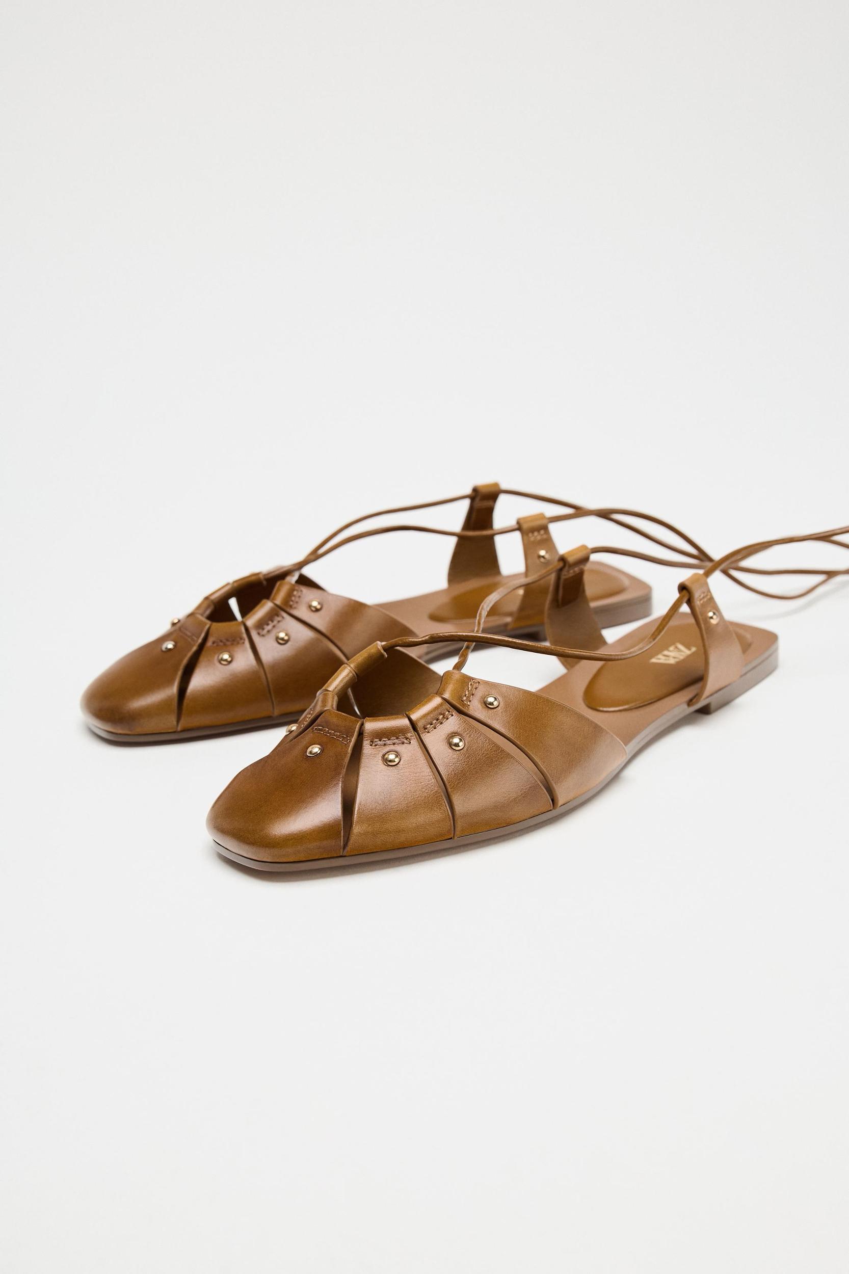 LEATHER TIED CAGE SANDALS Product Image