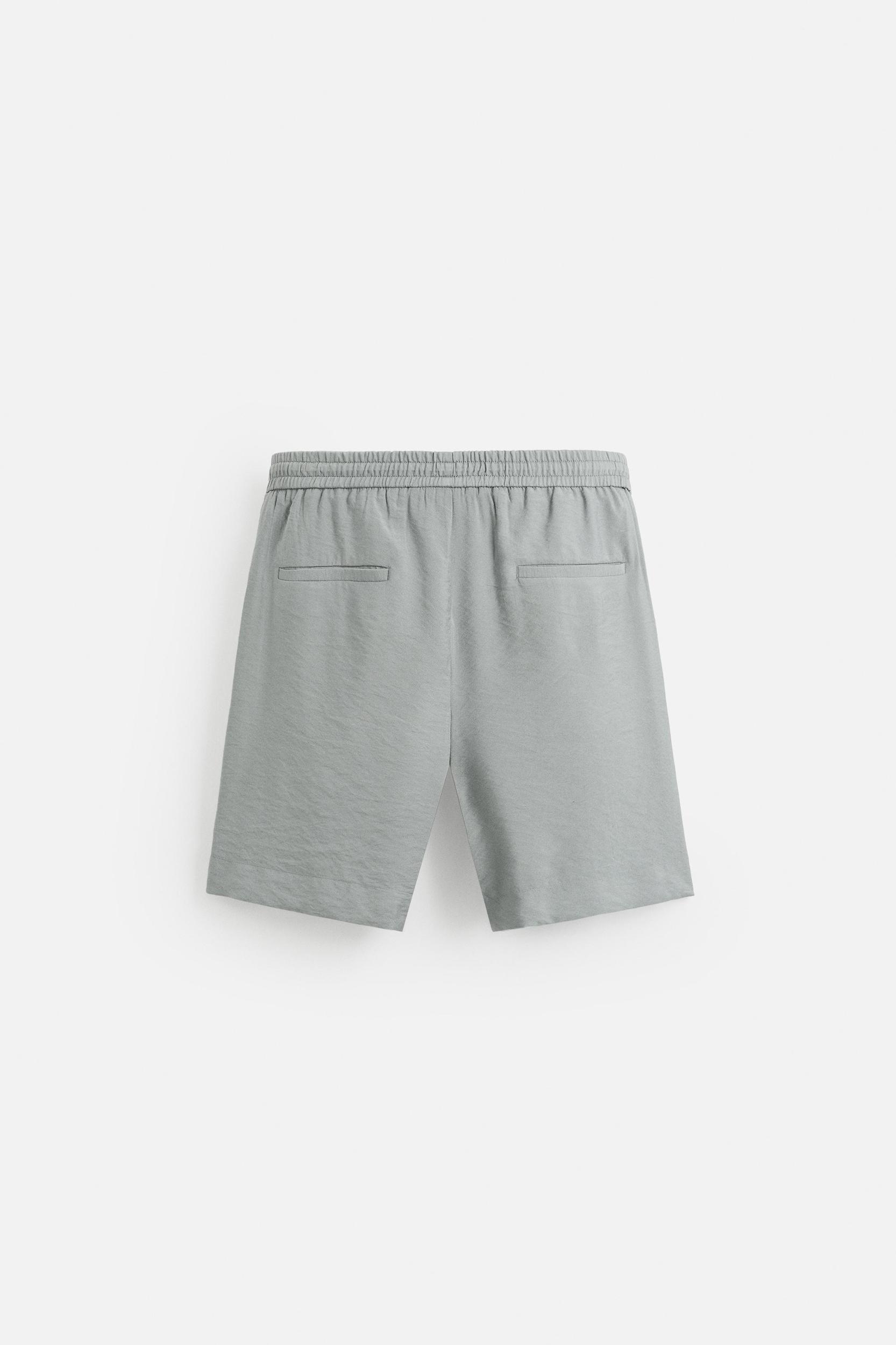 FLOWY RELAXED FIT BERMUDA SHORTS Product Image