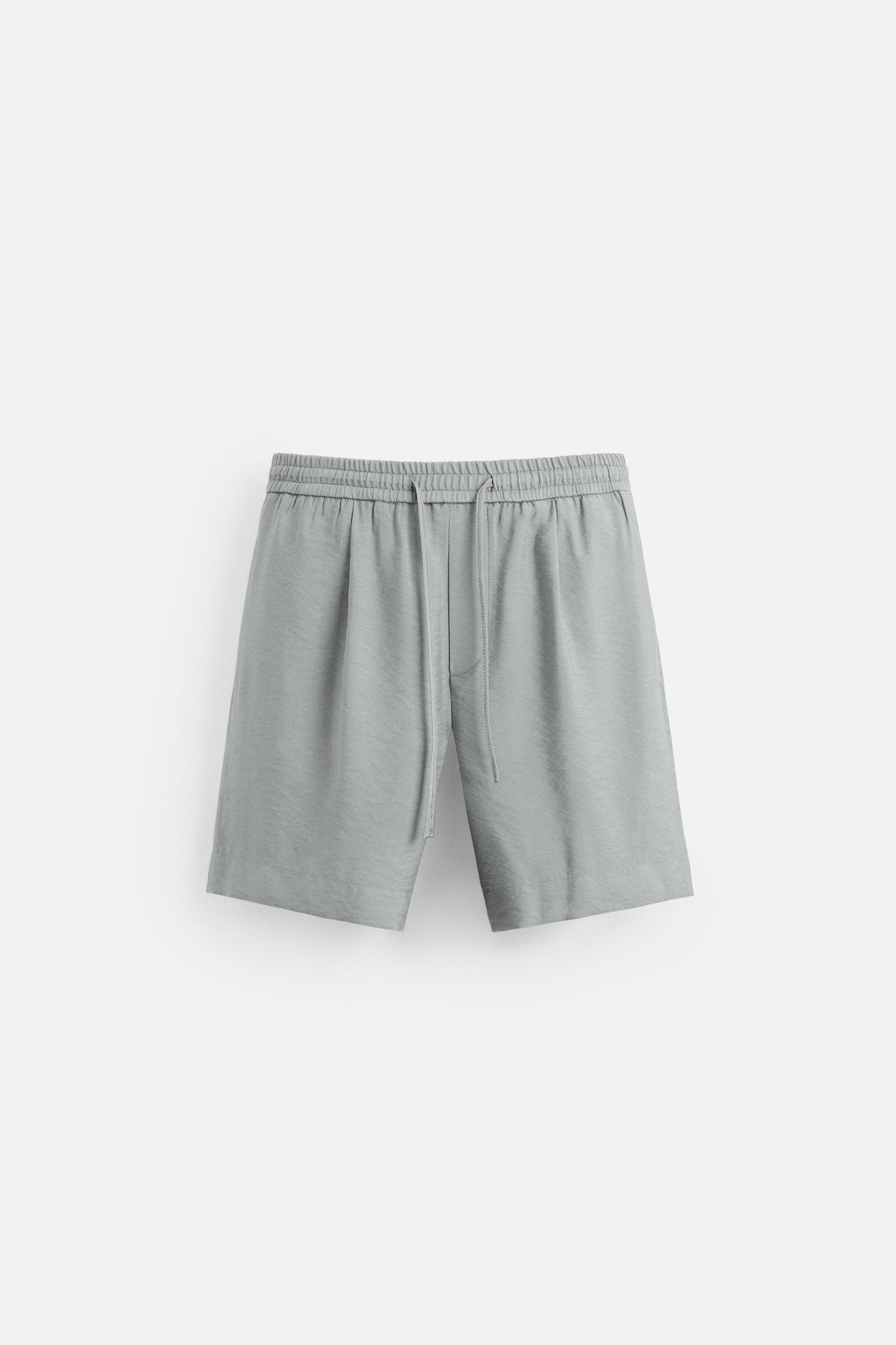 FLOWY RELAXED FIT BERMUDA SHORTS Product Image