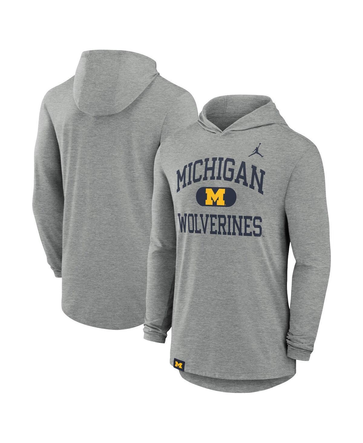 Michigan Wolverines Blitz Nike Men's Dri-FIT College Long-Sleeve Hooded T-Shirt Product Image