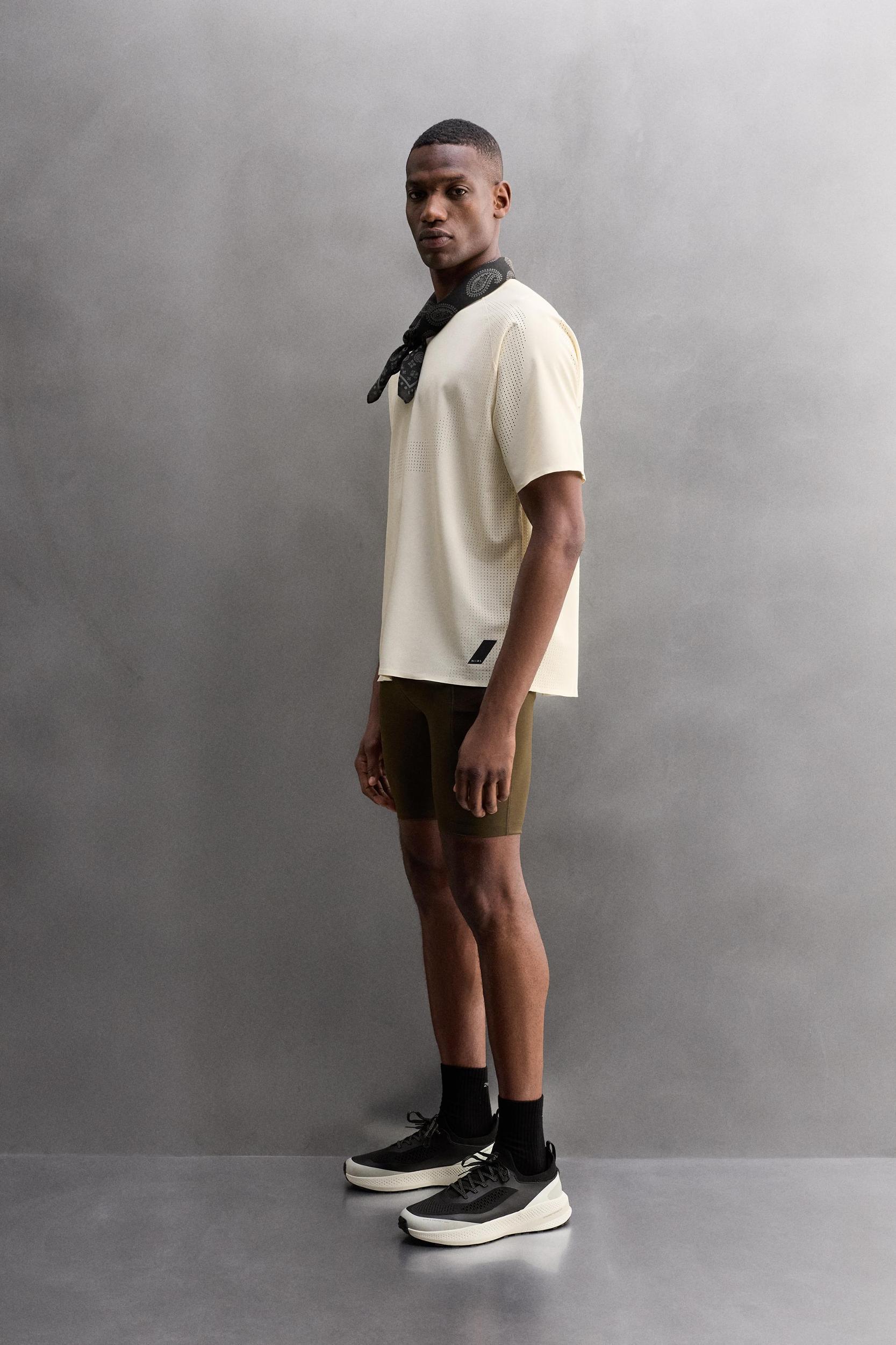 OPEN KNIT STRUCTURE T-SHIRT Product Image