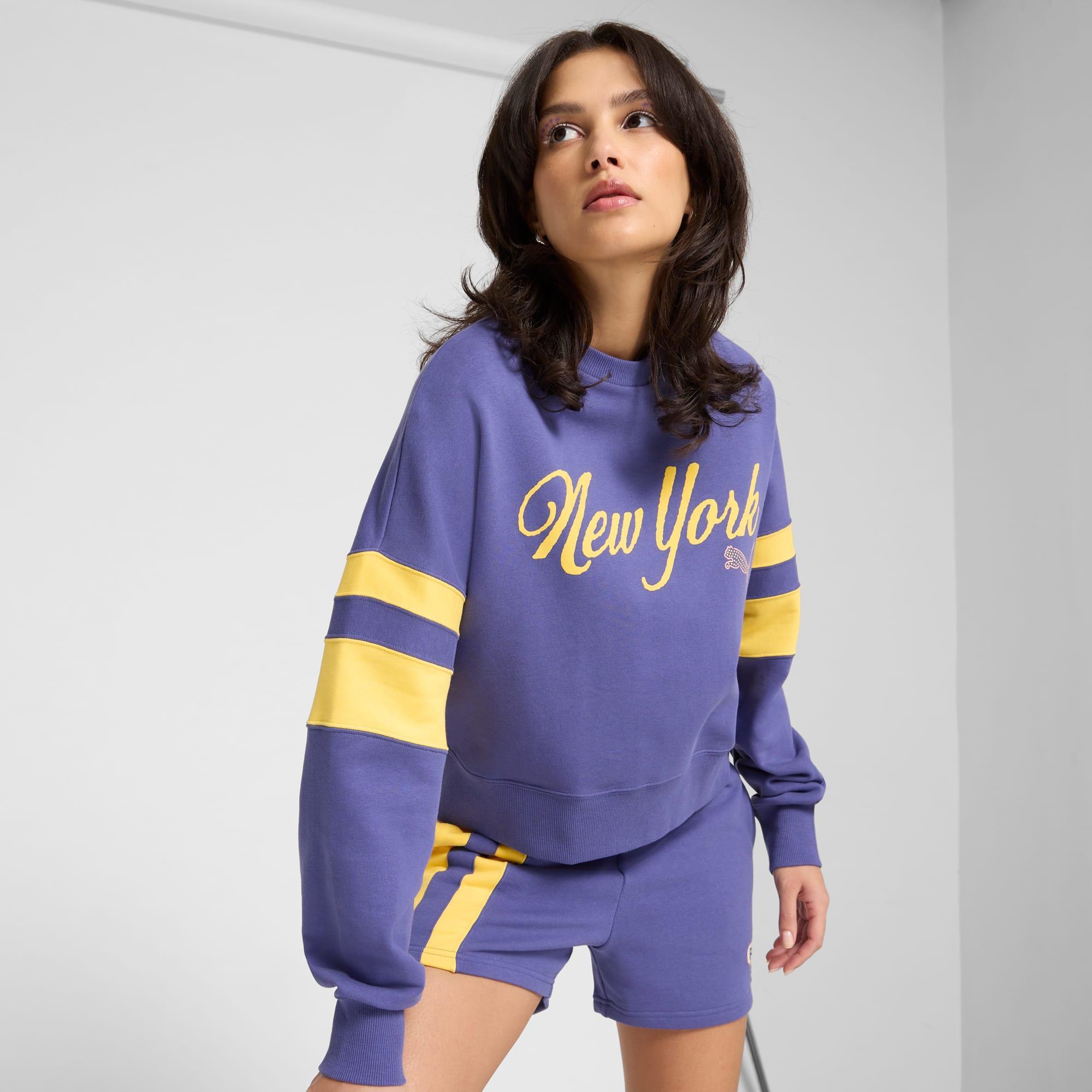 PUMA Wardrobe Essentials Bright Lights NYC Flagship Women's Crew Sweatshirt Product Image