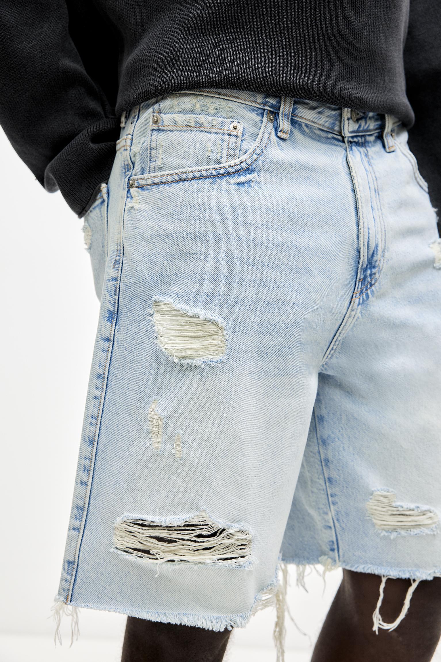 Ripped straight fit denim Bermuda shorts Product Image