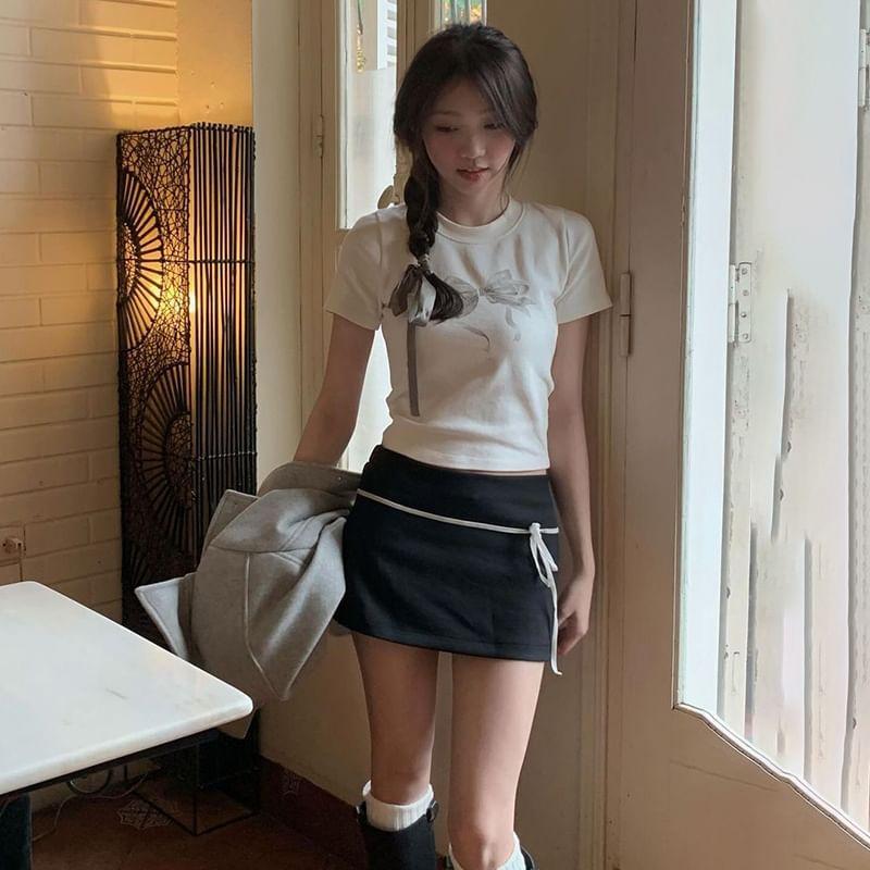 Mid Rise Bow Mini A-Line Skirt Product Image
