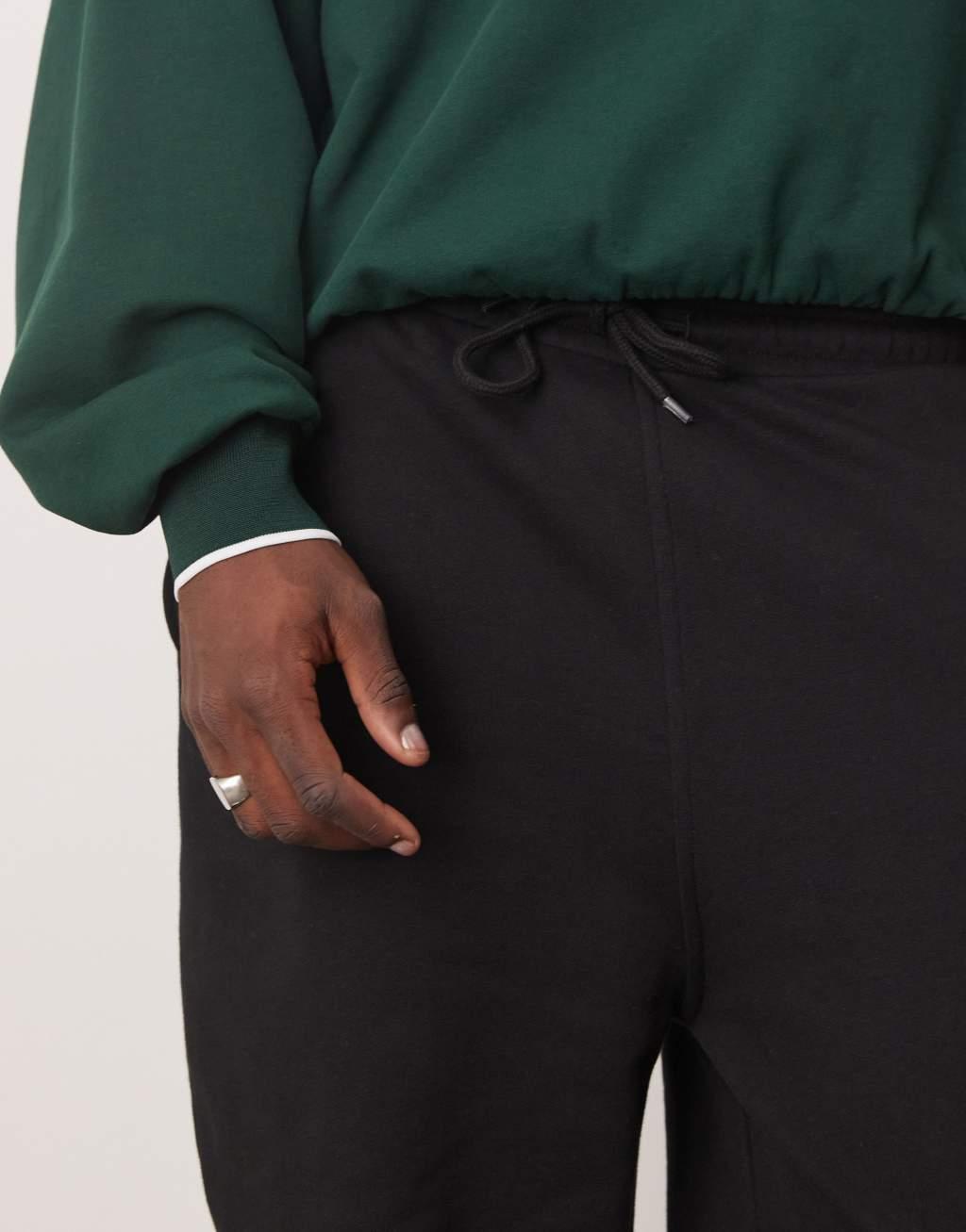 ASOS DESIGN oversized sweatpants in black Product Image