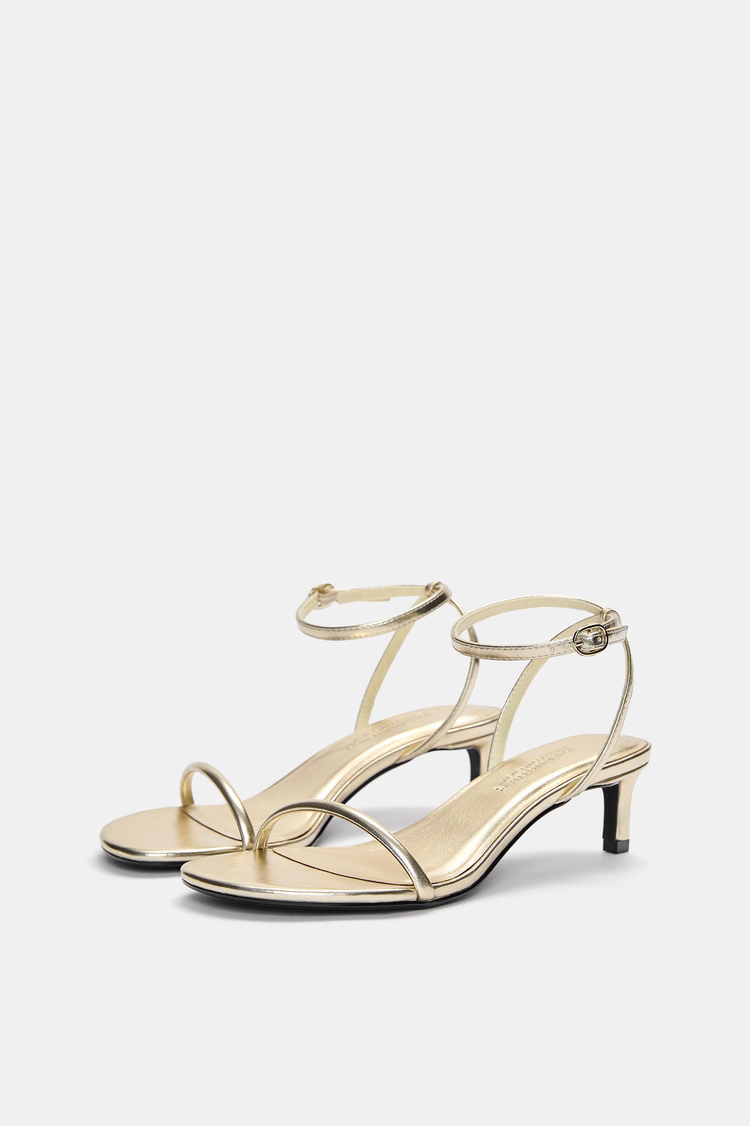 Golden heeled sandals Product Image