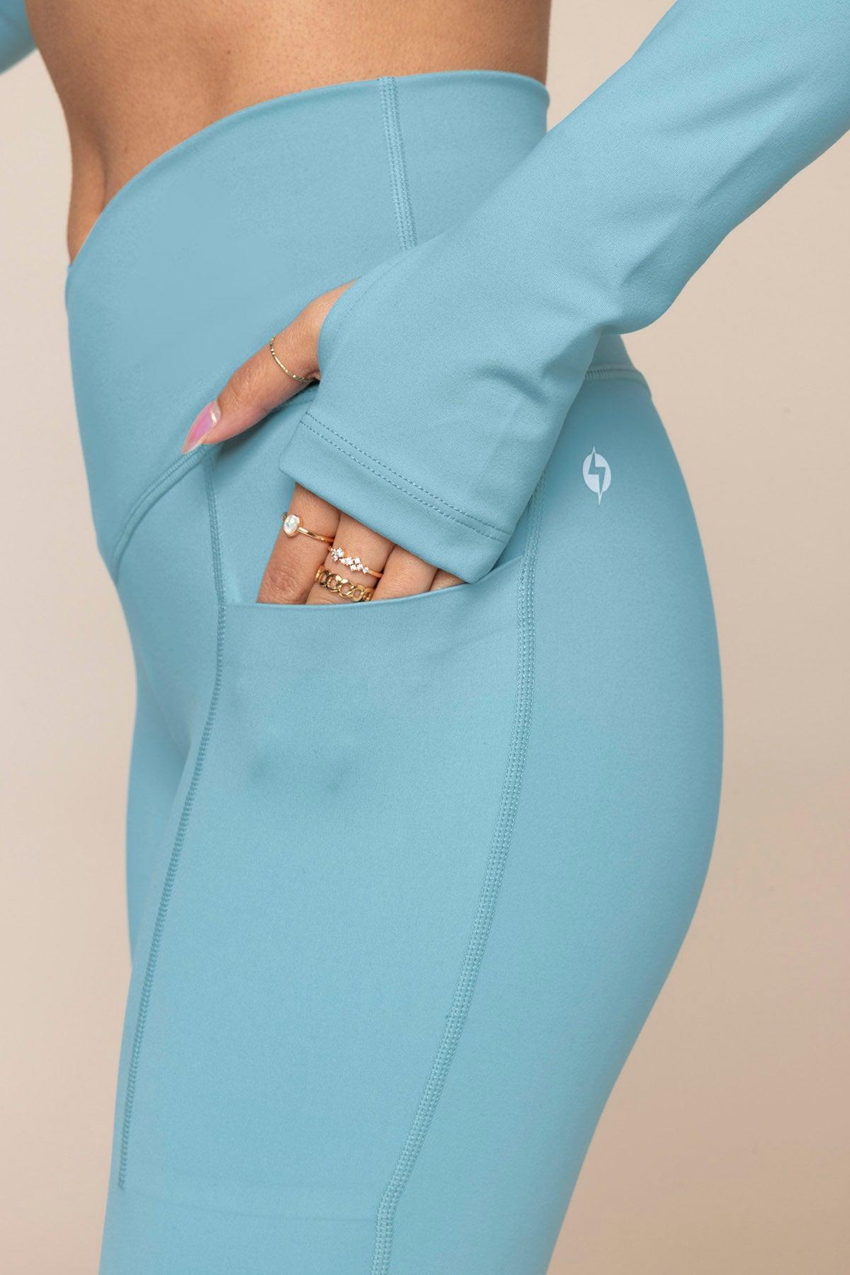 Crisscross Hourglass® Flared Leggings with Pockets - Oasis Product Image