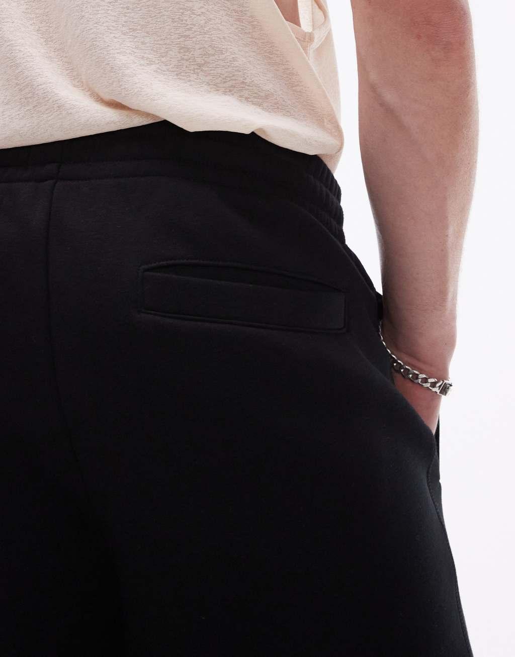Topman premium heavyweight oversized jersey shorts in black Product Image