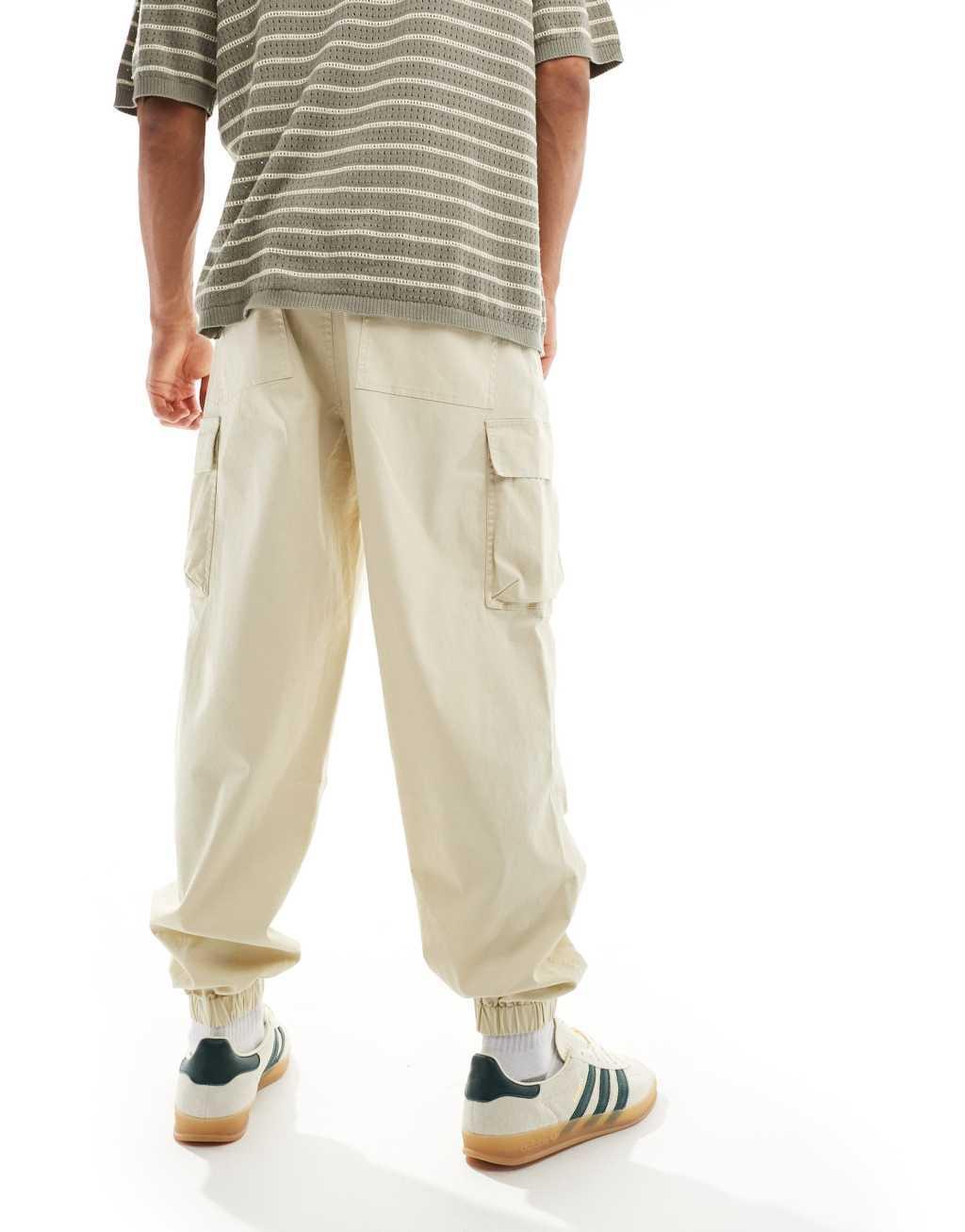 ASOS DESIGN oversized tapered cargo pants in stone Product Image