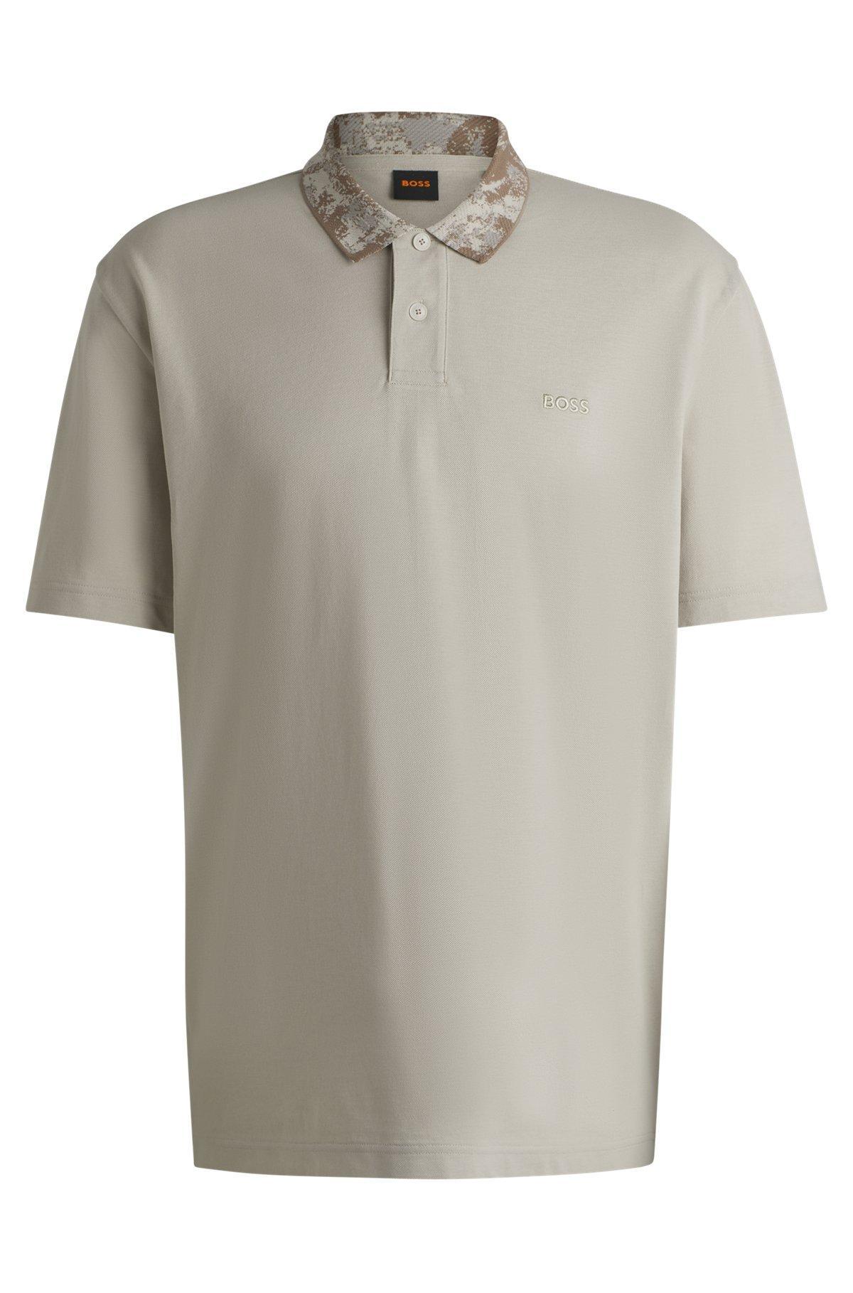 Cotton-piqué polo shirt with jungle-artwork collar Product Image