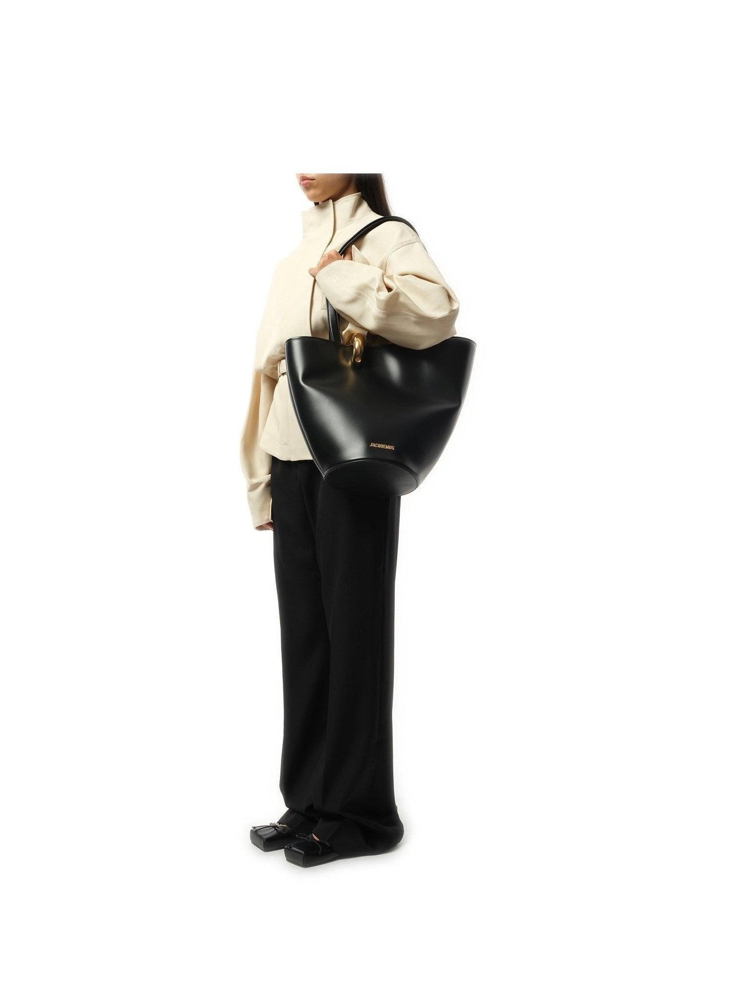 JACQUEMUS The Medium Bambola Asymmetric Leather Bucket Bag In Black 990 Product Image