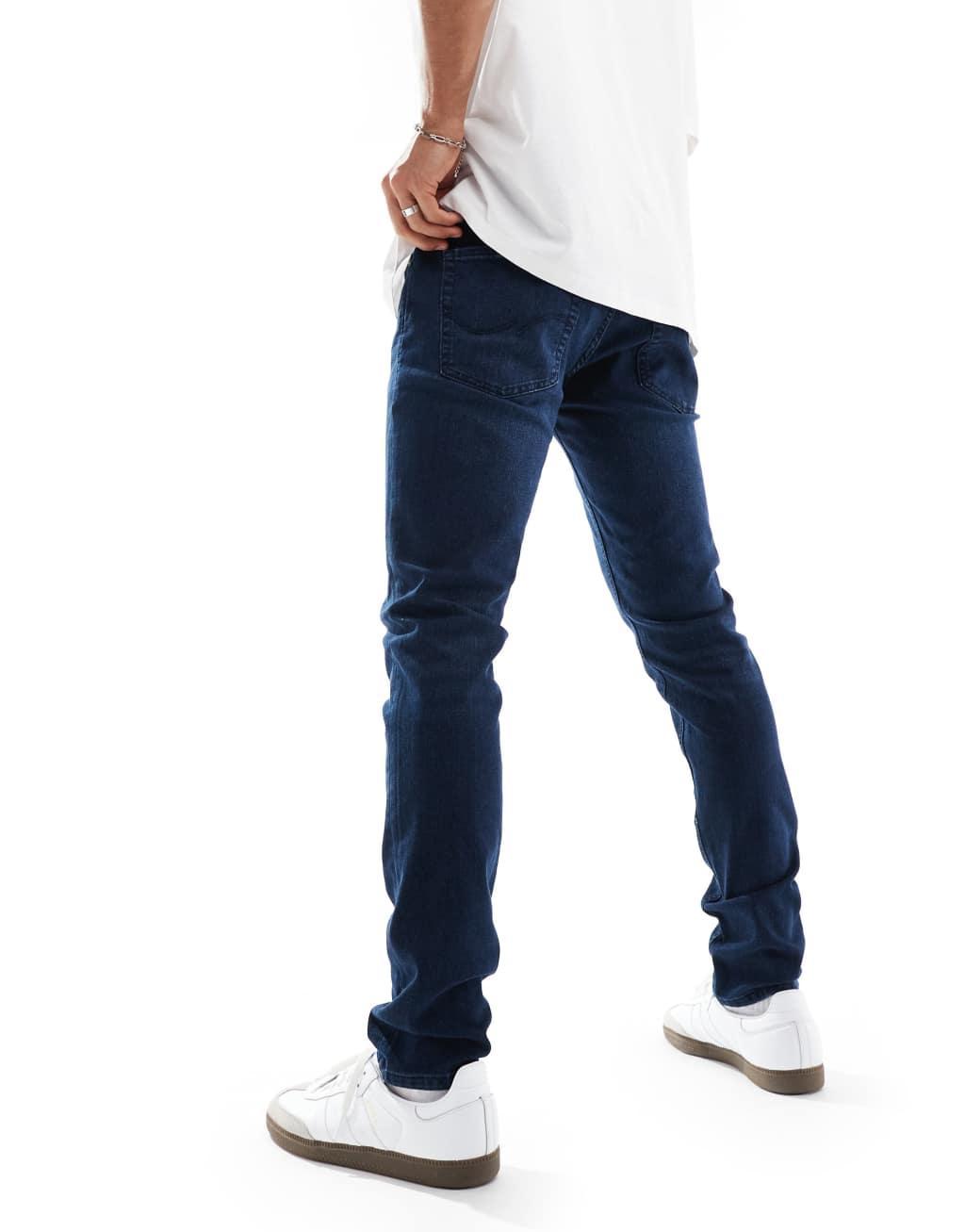 Jack & Jones liam skinny jeans in dark blue wash Product Image