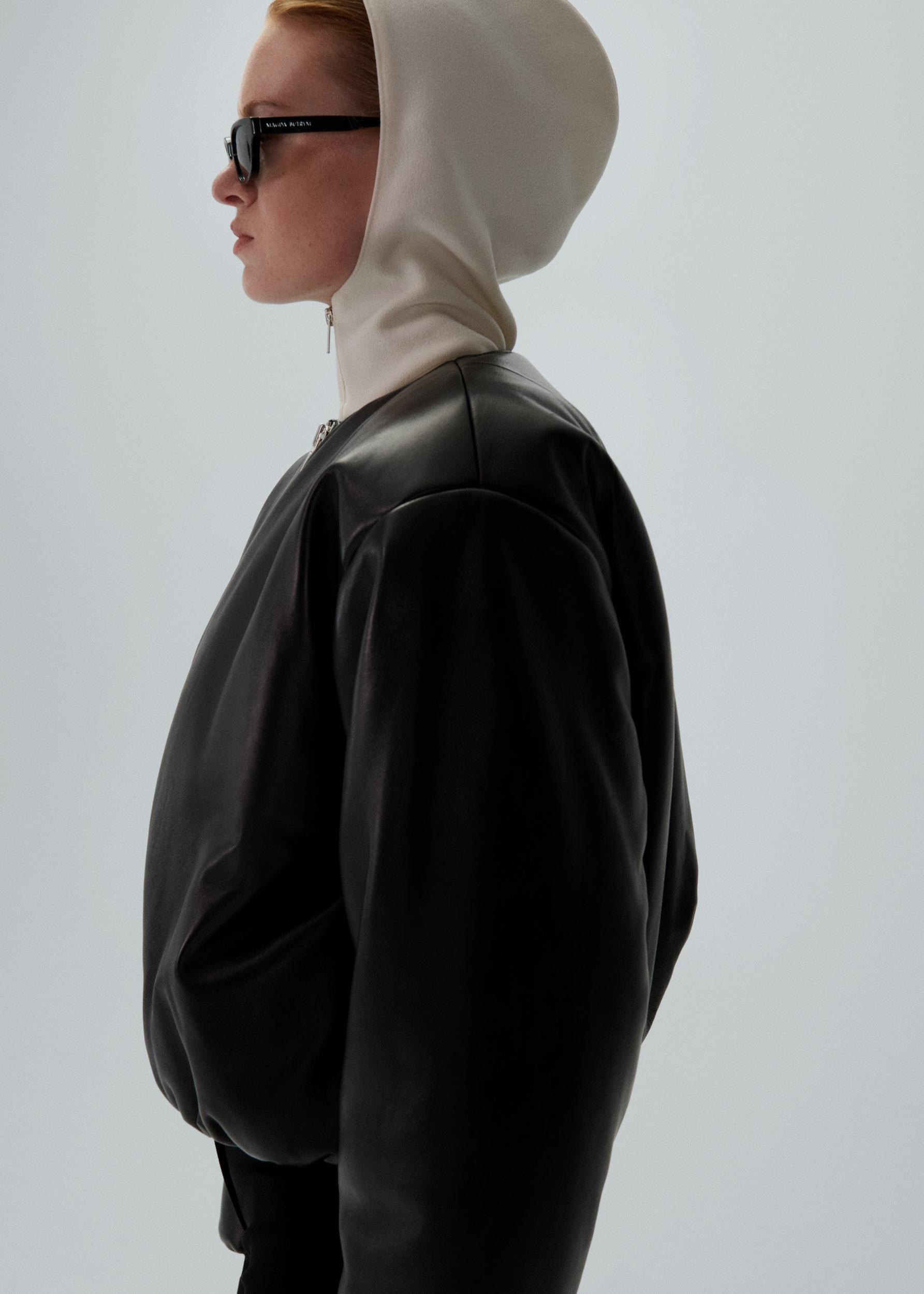 Collarless puffer jacket in black leather Product Image