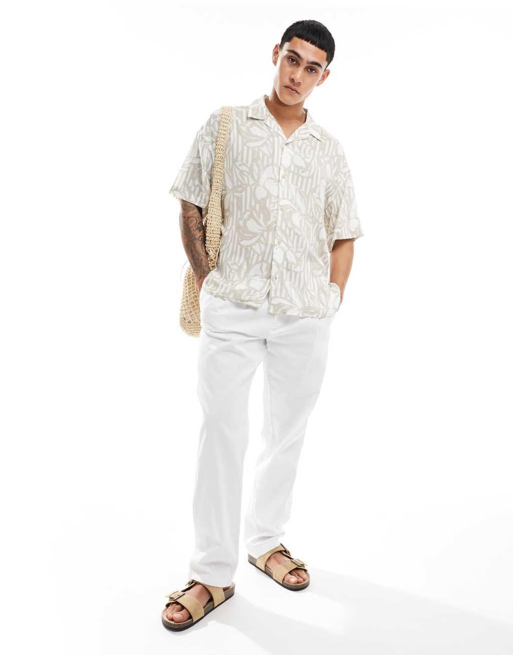 ADPT oversized revere collar shirt with floral print in beige Product Image