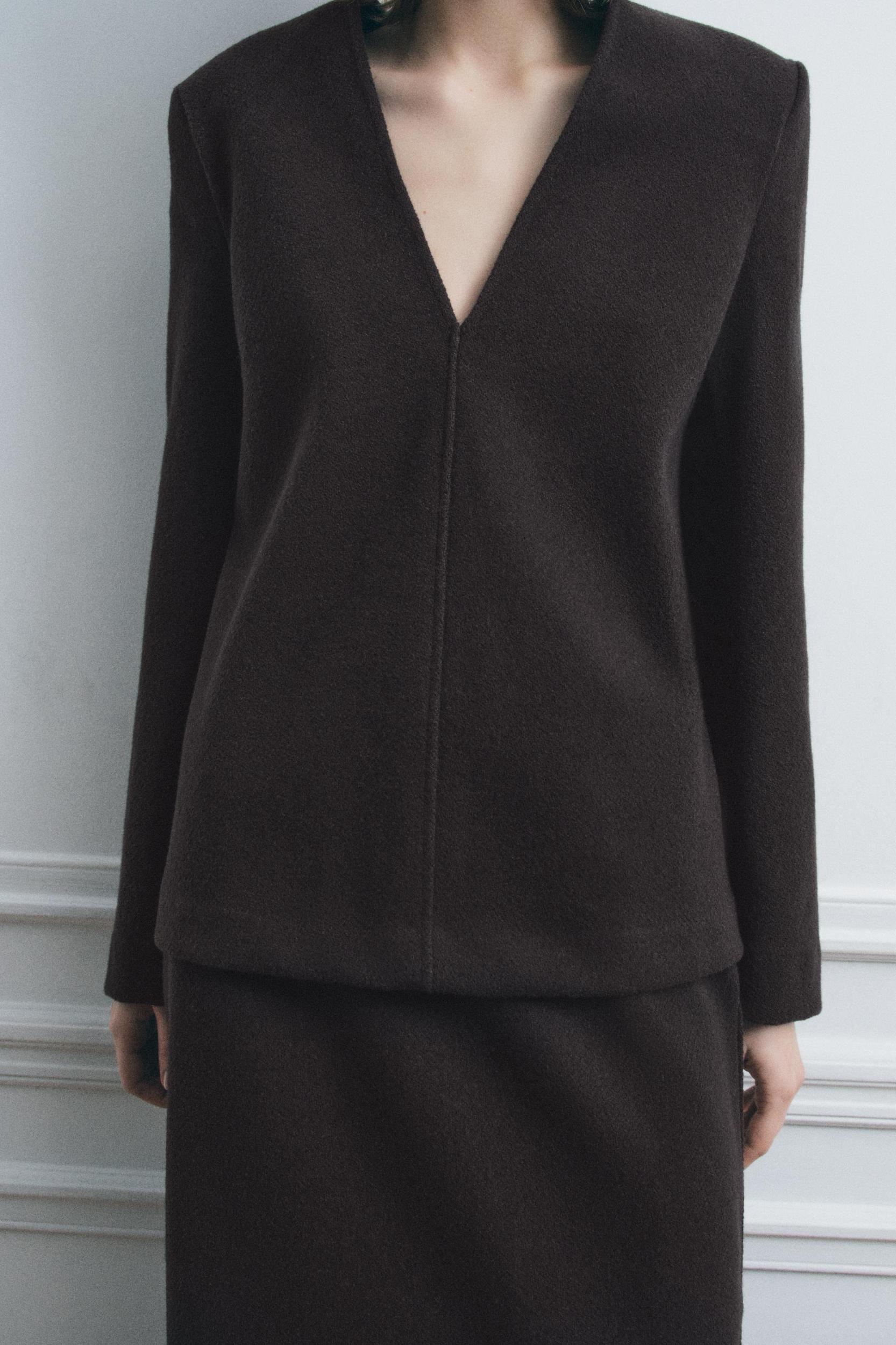 V-NECK SHOULDER PAD TOP Product Image