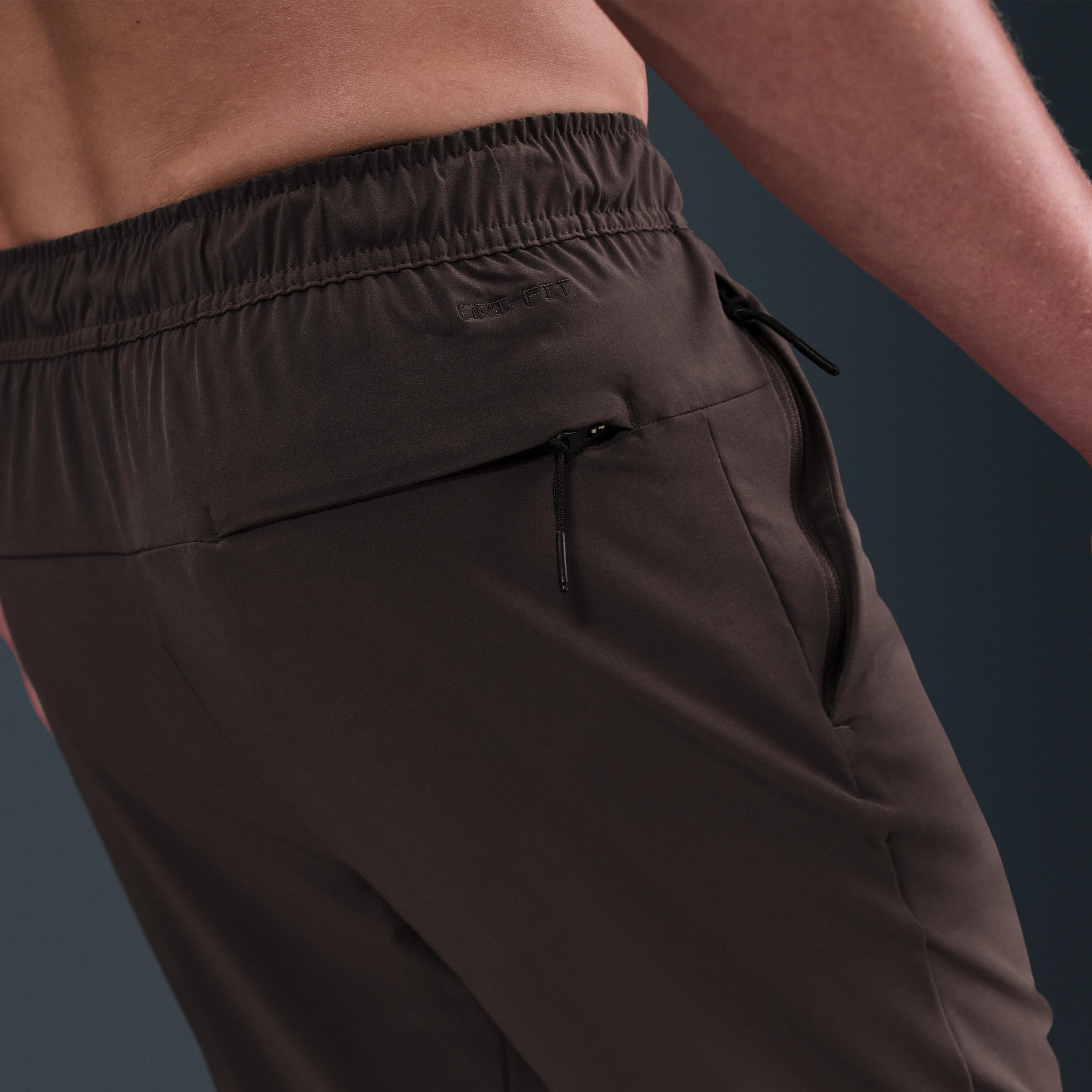 Nike Unlimited Men's Dri-FIT Zippered Cuff Versatile Pants Product Image