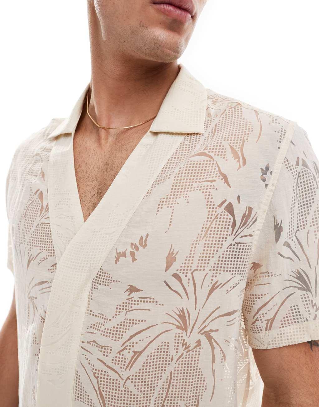 ASOS DESIGN relaxed low neck burn out shirt in stone  Product Image