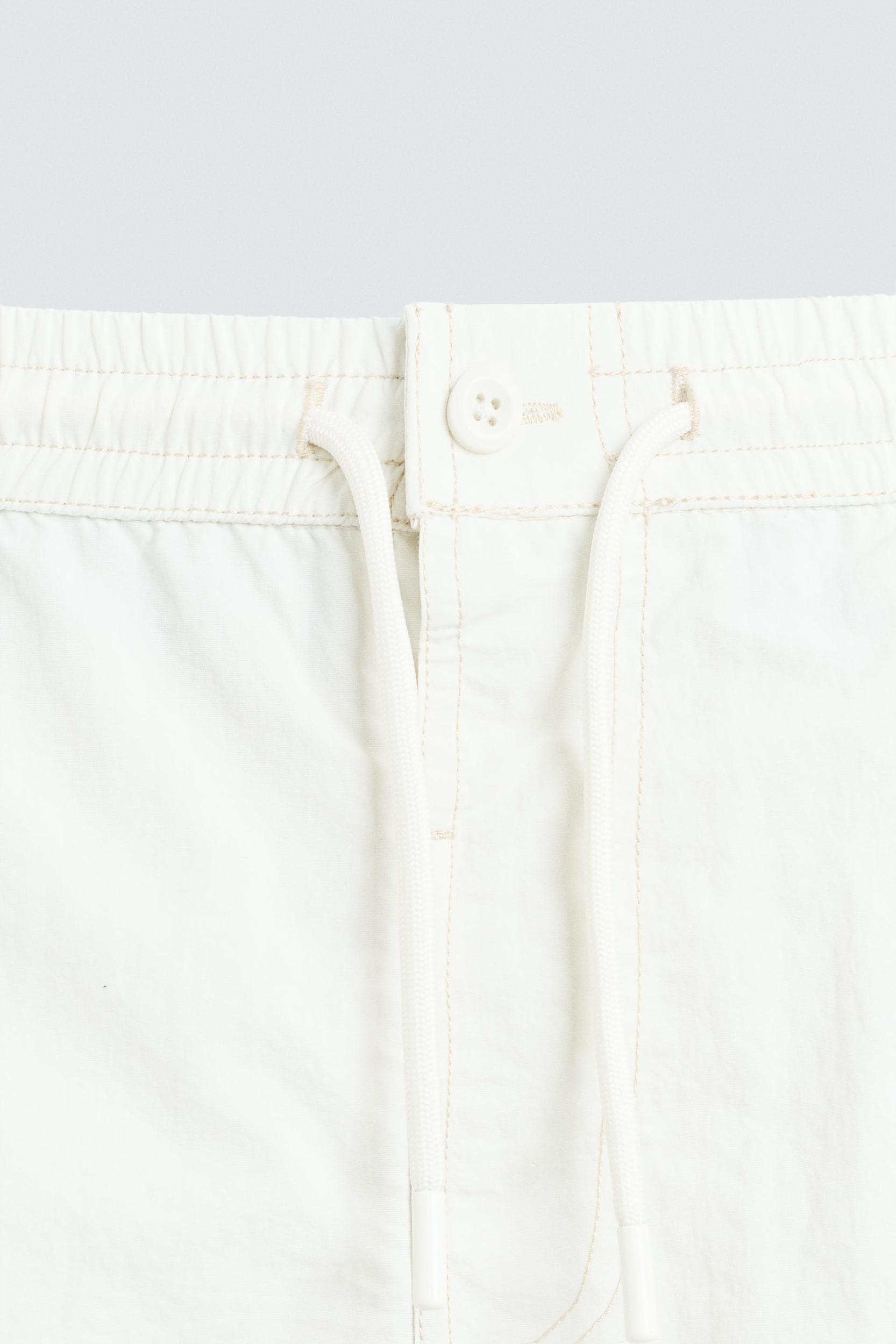 CONTRAST MID-LENGTH SWIMSUIT Product Image