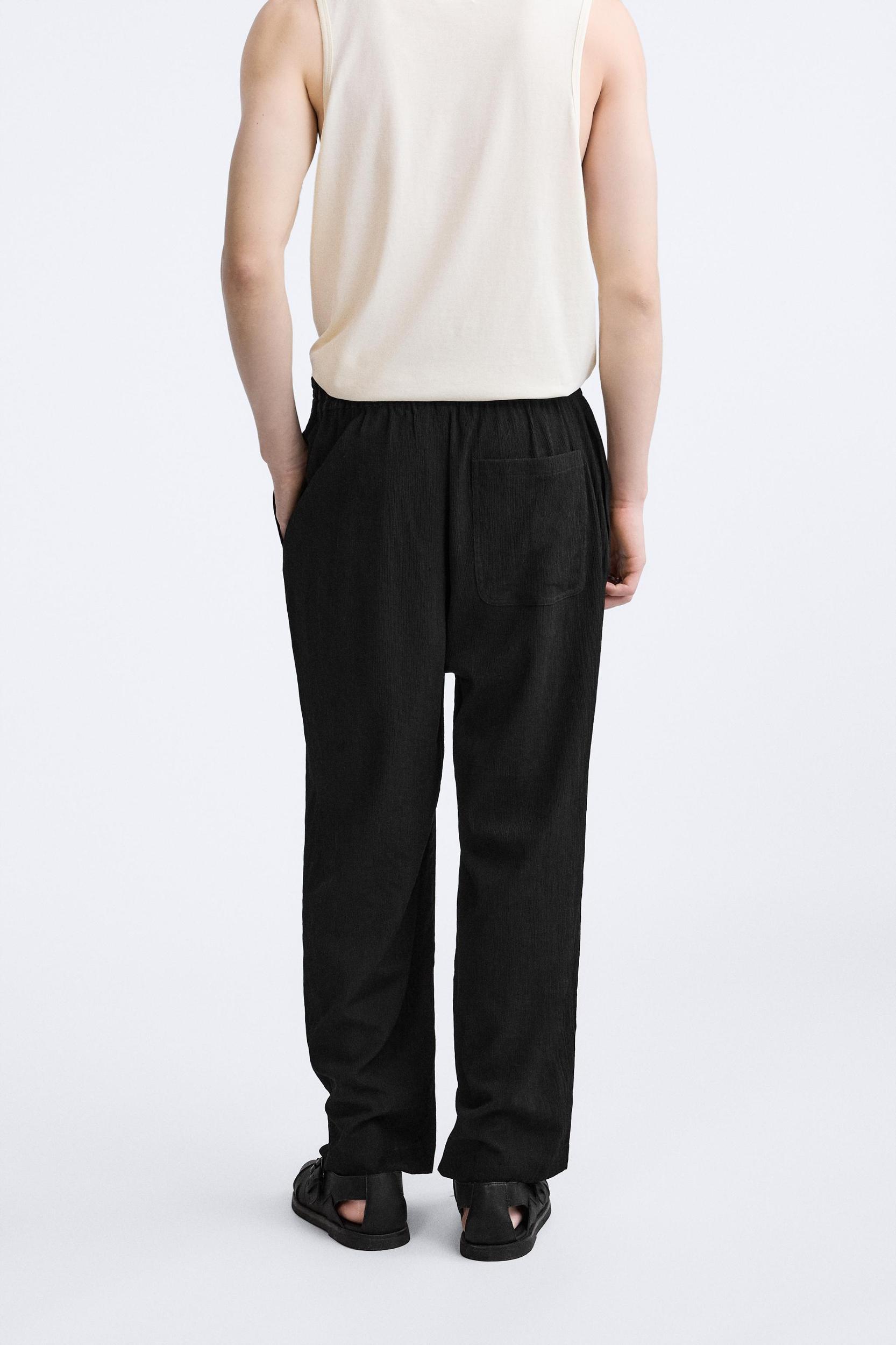 PLEATED PANTS Product Image