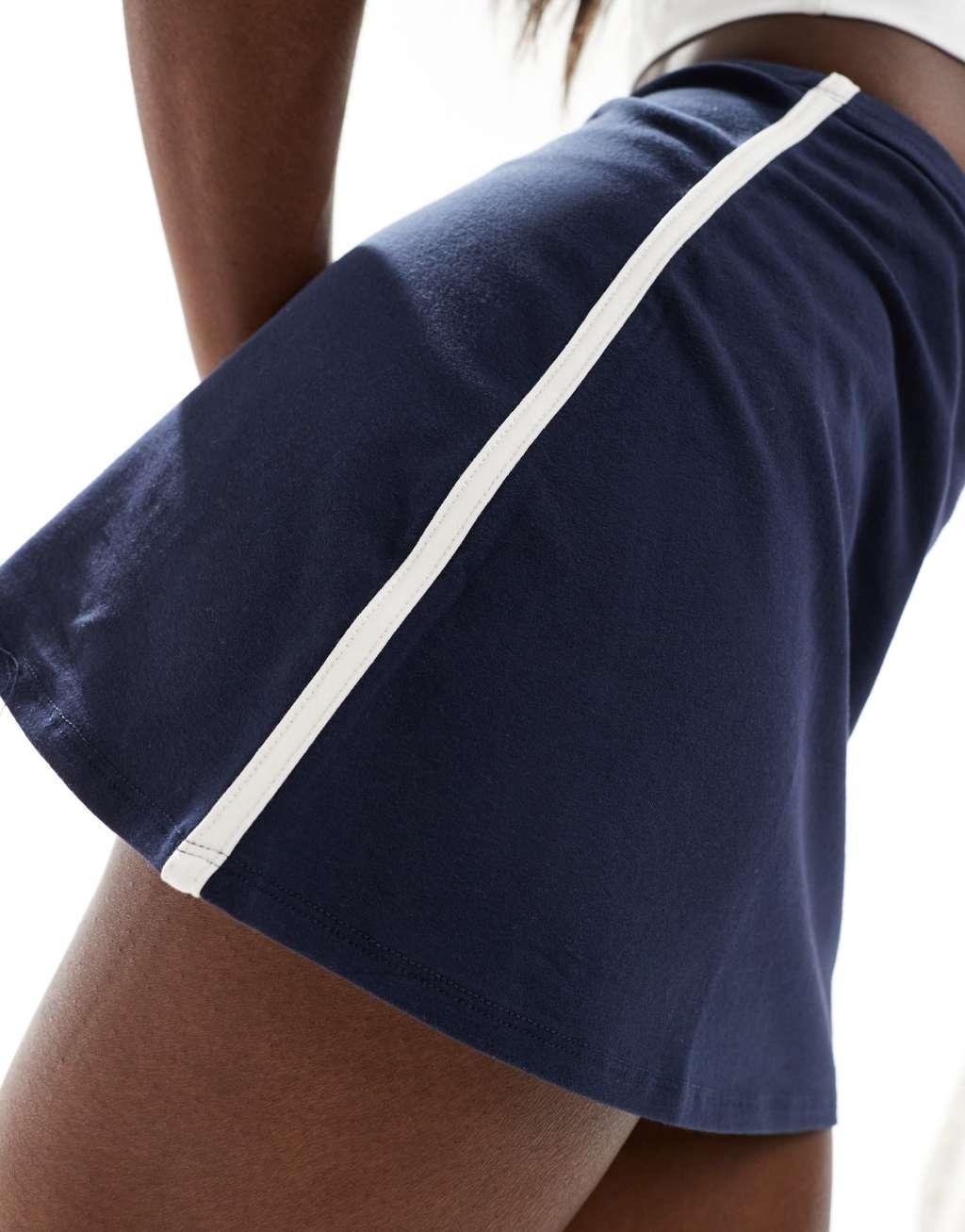 Cotton On mini sport skirt in navy with white stripe Product Image