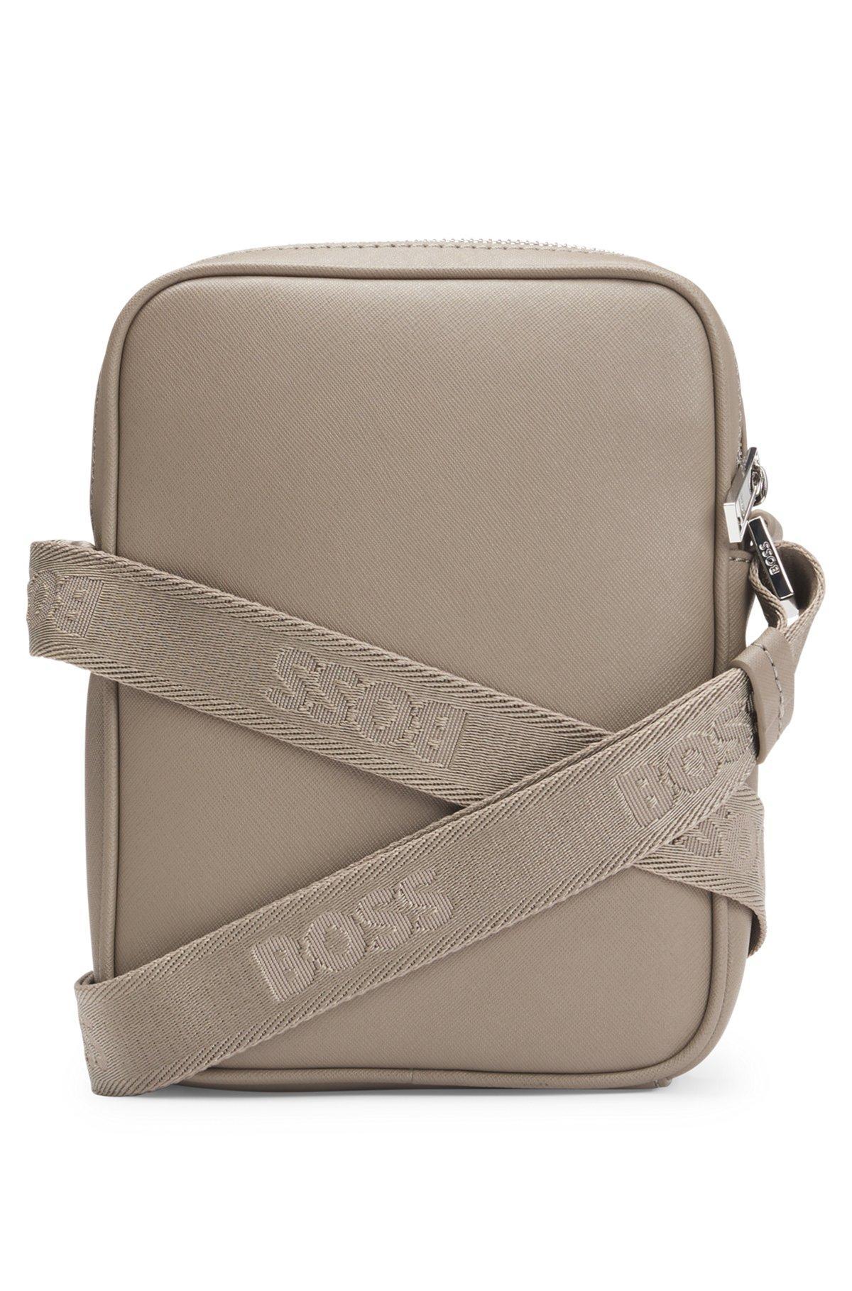 Reporter bag with signature stripe and logo detail Product Image