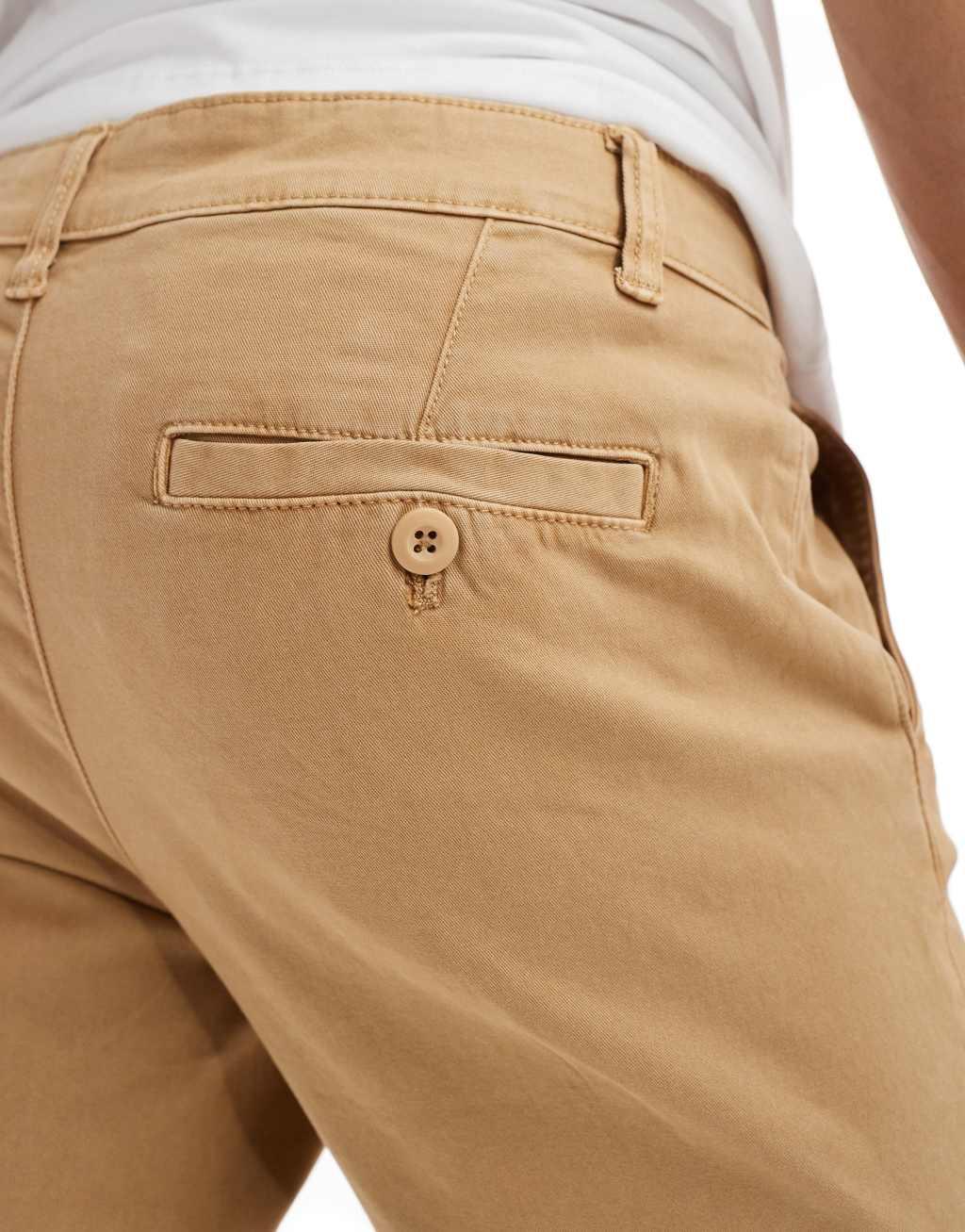 ASOS DESIGN tapered washed chinos in tan Product Image