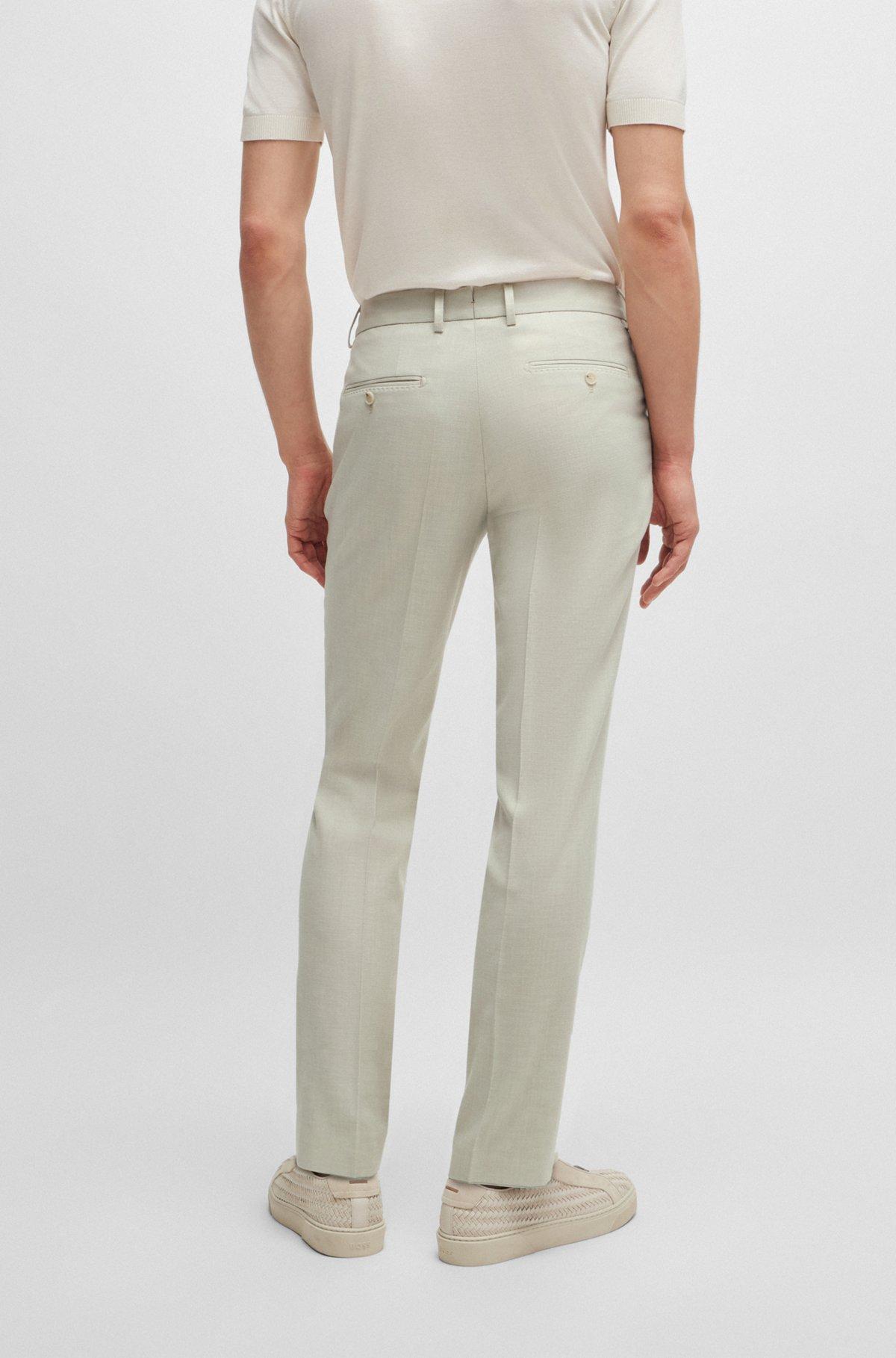 Slim-fit trousers in micro-patterned stretch material Product Image