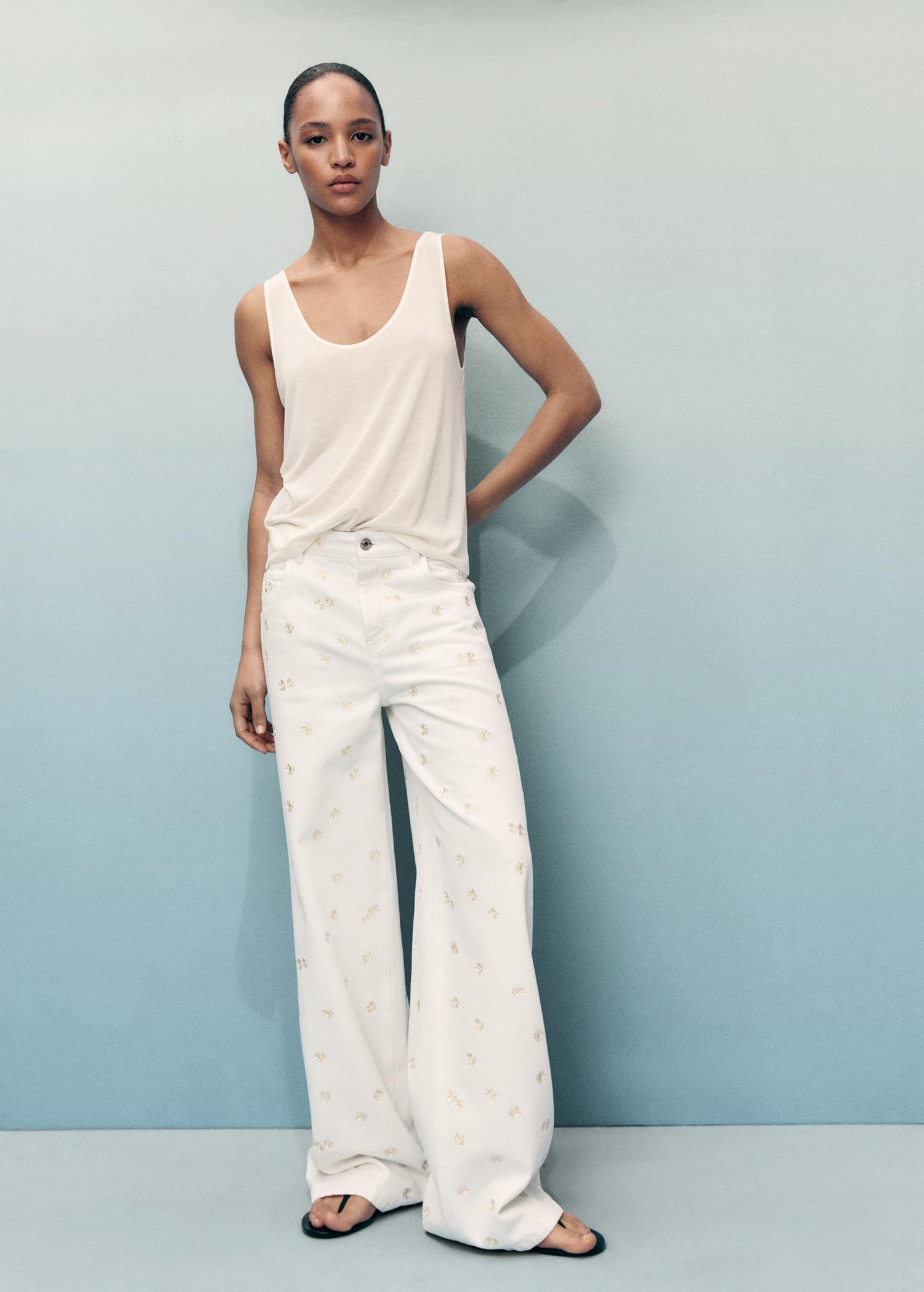 Flower-embroidered wideleg jeans - Women | MANGO USA Product Image