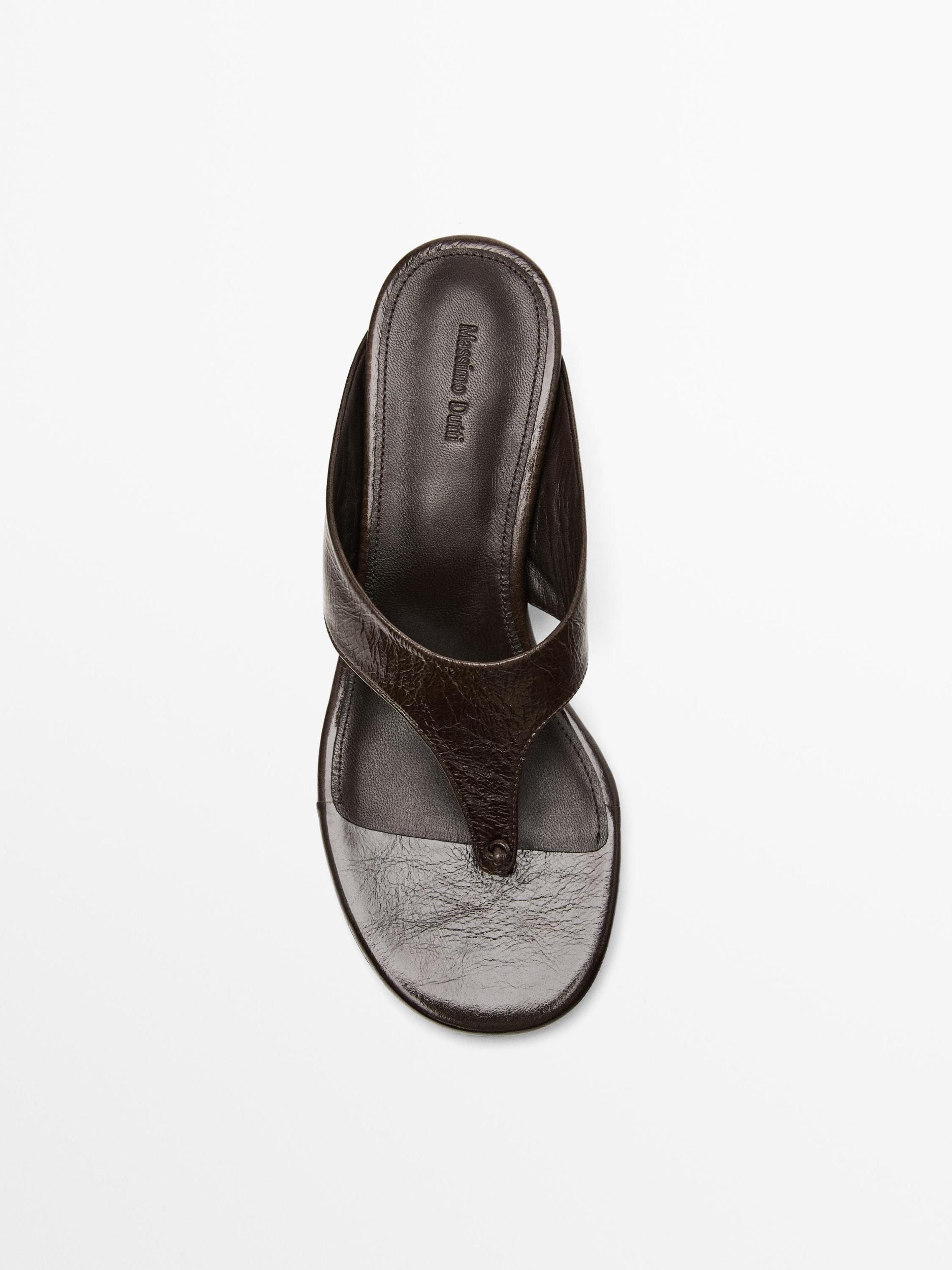 Heeled sandals with toe divider Product Image