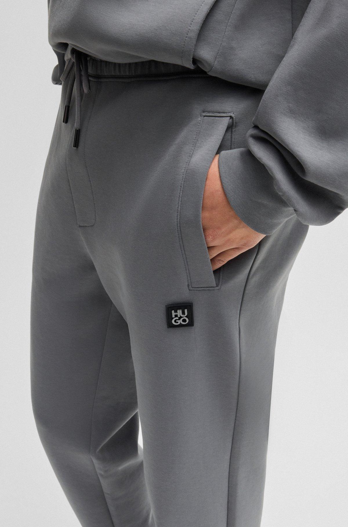 Cotton tracksuit bottoms with stacked logo Product Image