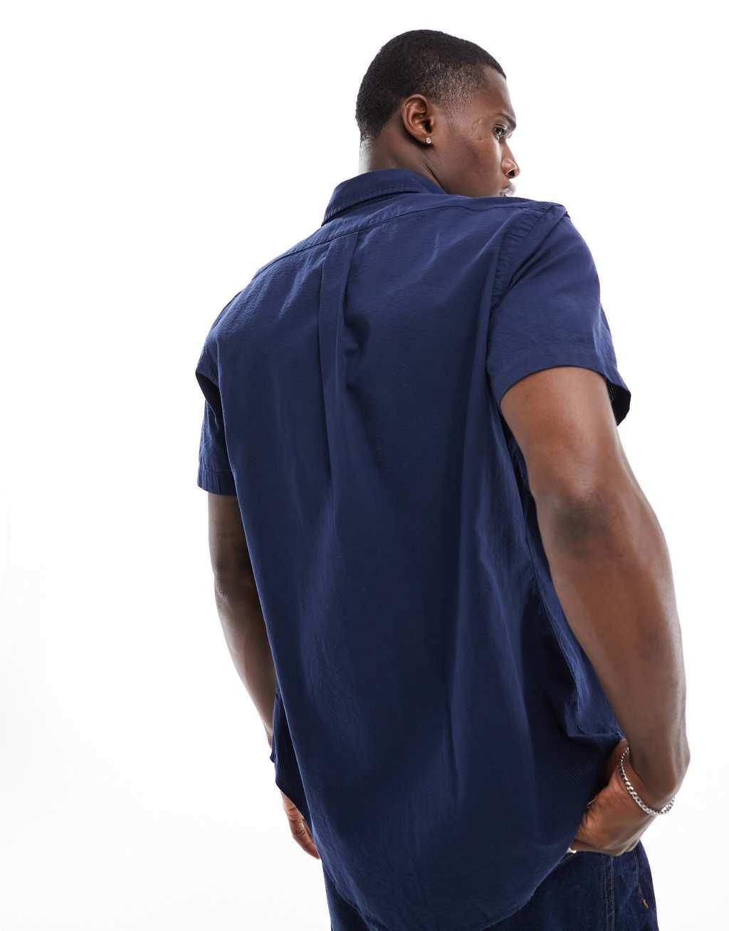 Polo Ralph Lauren icon logo short sleeve seersucker shirt in astoria navy Product Image