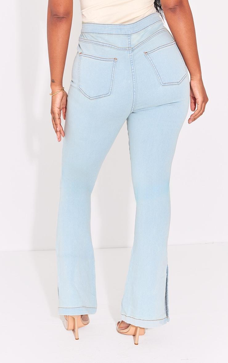 PRETTYLITTLETHING Shape Light Blue Wash Split Hem Detail Flared Jeans Product Image