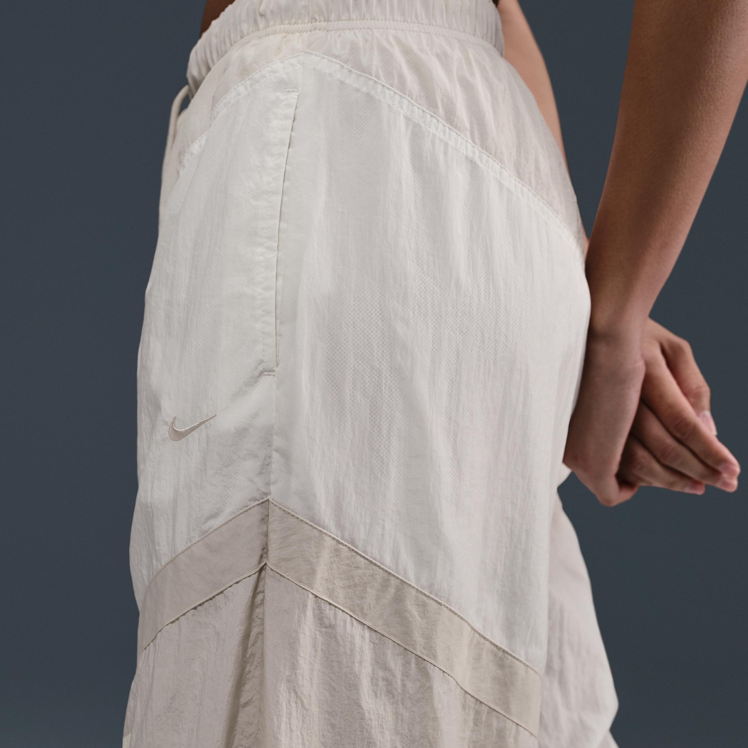 Women's Nike Sportswear Mid-Rise Loose Woven Open-Hem Pants Product Image