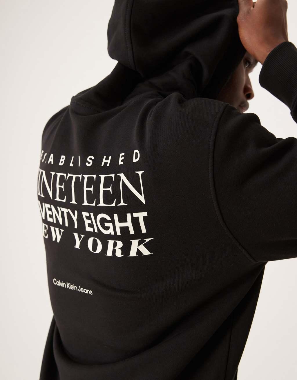 Calvin Klein Jeans text backprint hoodie in black Product Image