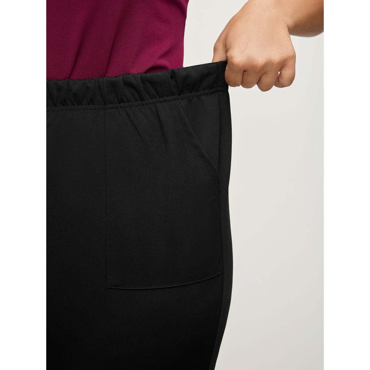 Plus Size Solid Pocket Flare Leg Elastic Waist Pants Women Black At the Office Flare Leg High Rise Work Pants BloomChic 14-16/1X Product Image