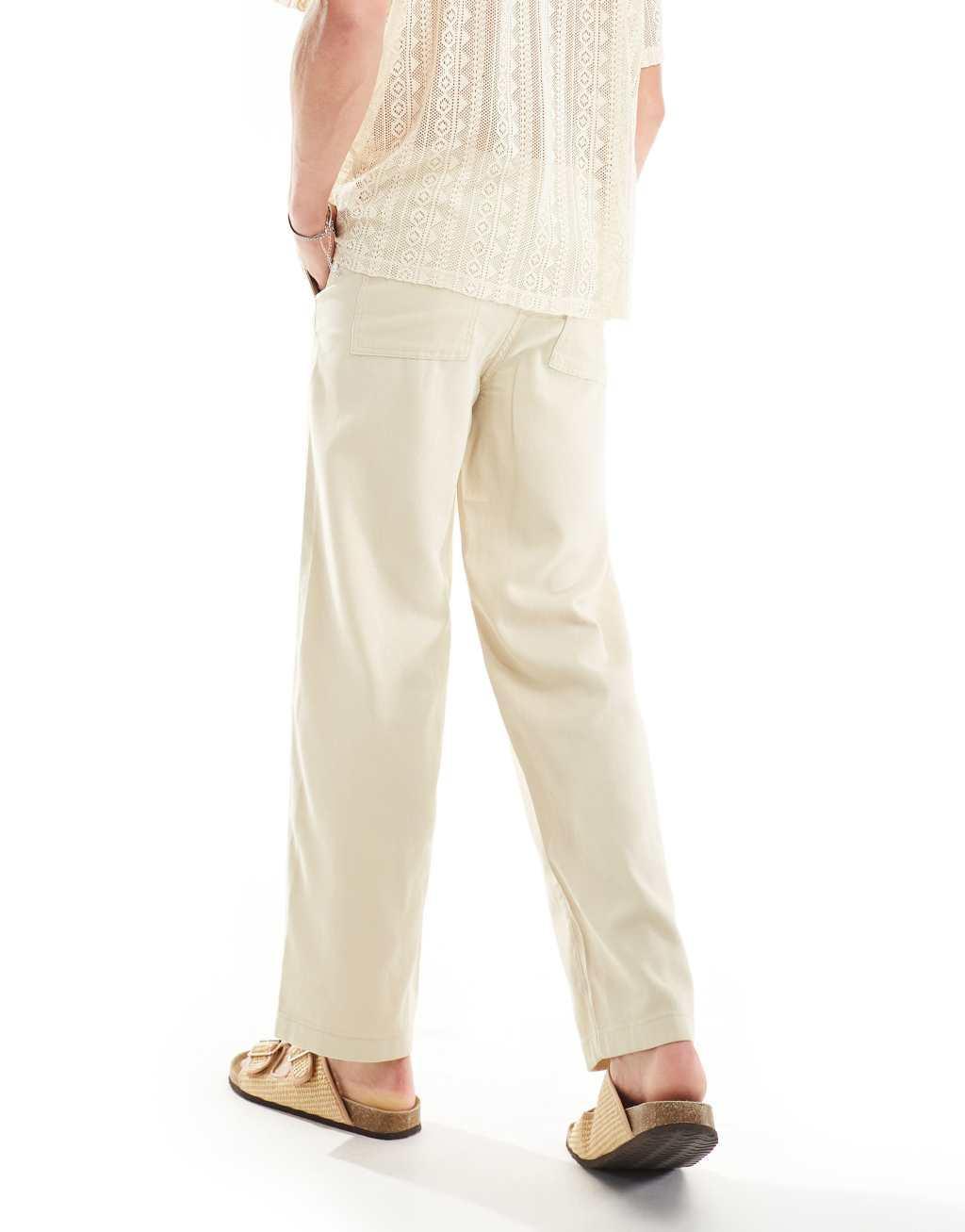Selected Homme linen mix loose fit pants in beige Product Image