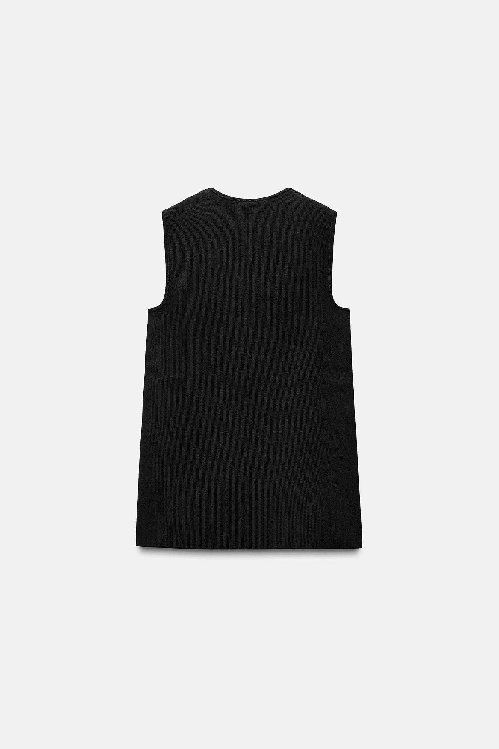 KNIT TOP WITH SIDE BUTTONS Product Image