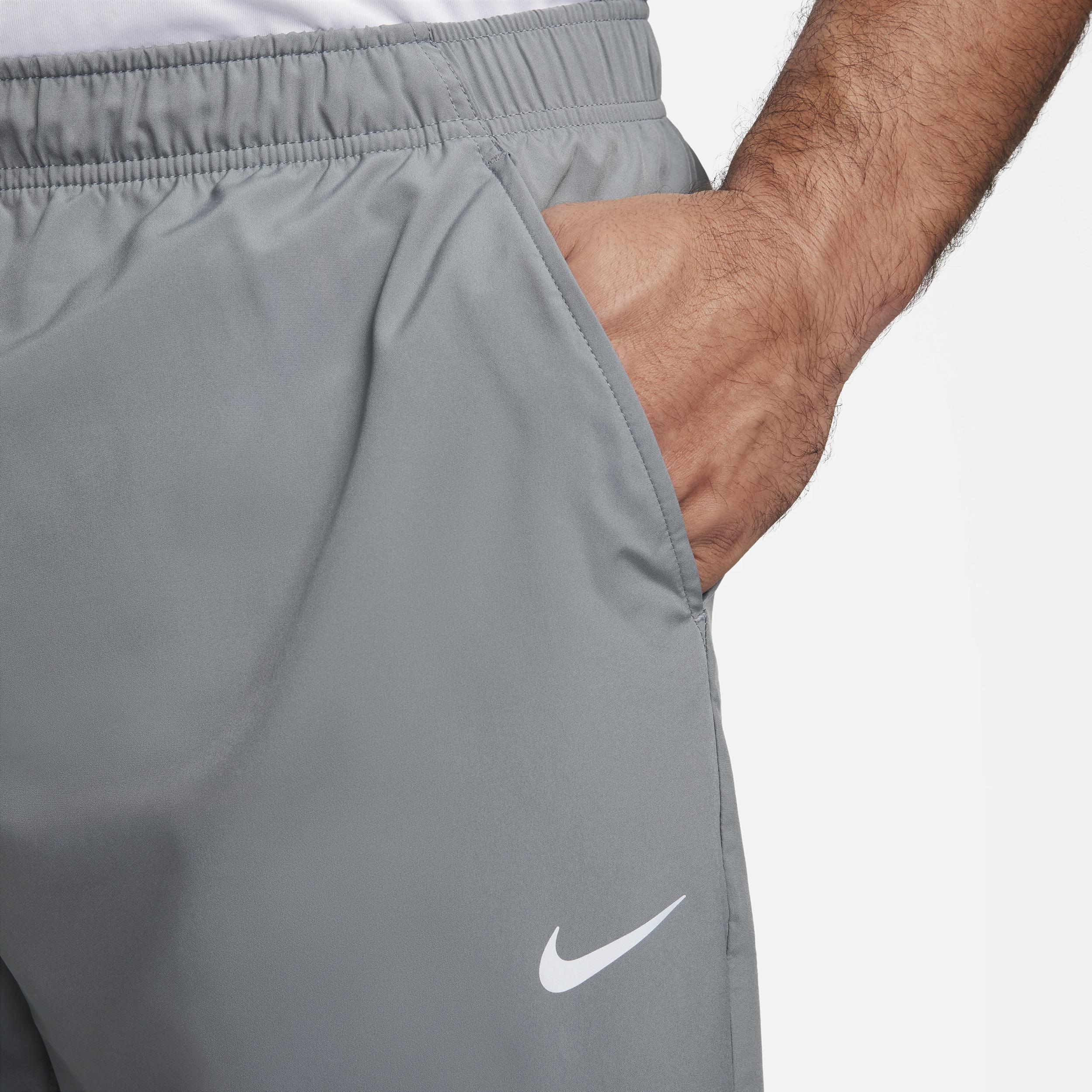 Nike Men's Form Dri-FIT Tapered Versatile Pants in Grey/Smoke Grey Size Large 100% Polyester Product Image