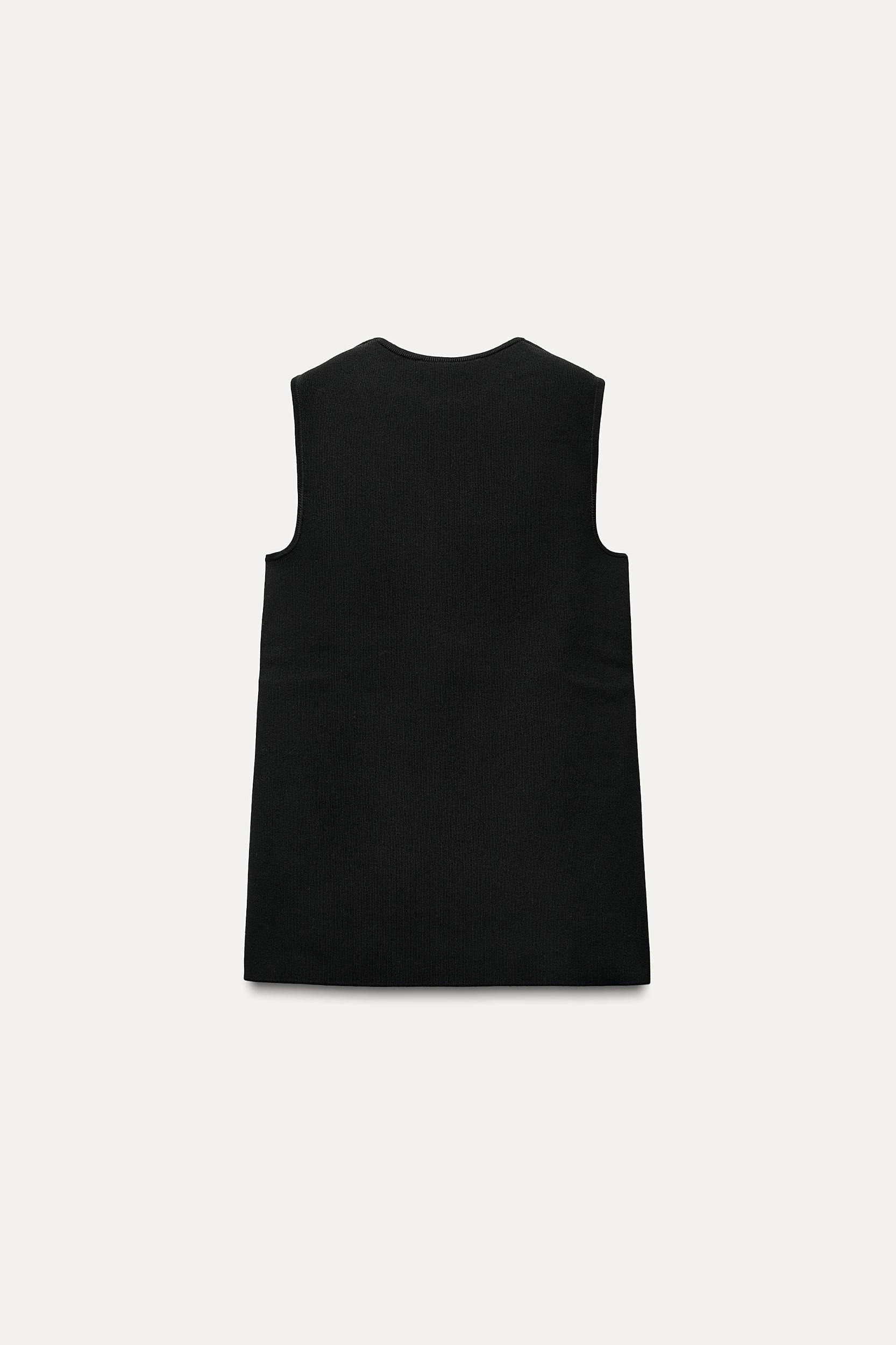 KNIT TOP WITH SIDE BUTTONS Product Image