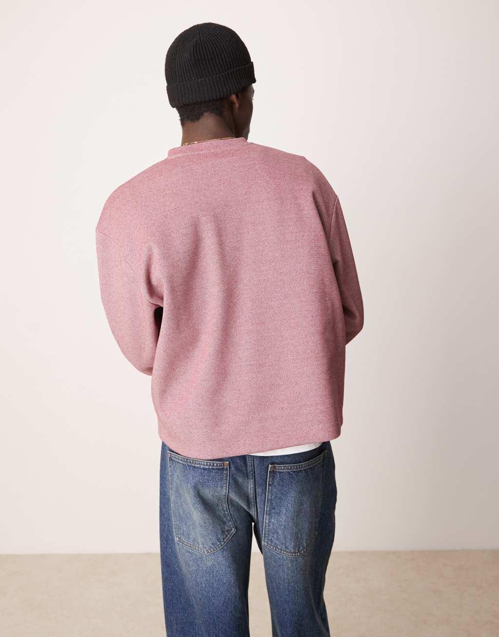 ASOS DESIGN oversized boxy pique sweater with henley neck in dark pink Product Image