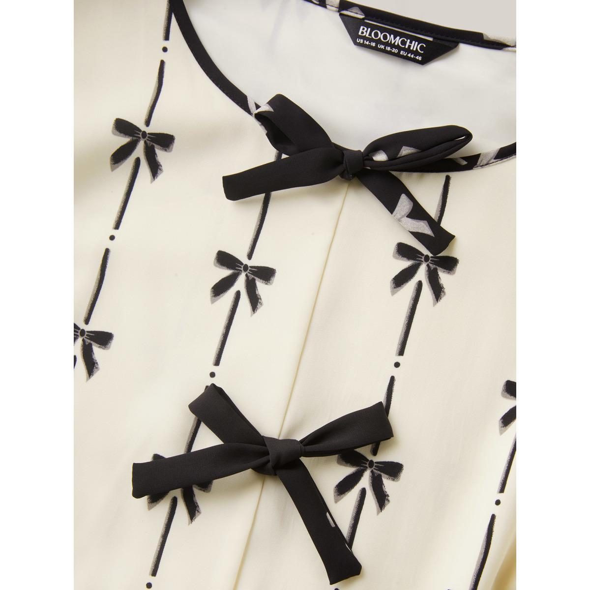 Plus Size Beige Bow Detail Printed Color Contrast Blouse Women Half Sleeve V-neck Everyday-Elegant Blouses BloomChic 12/L Product Image