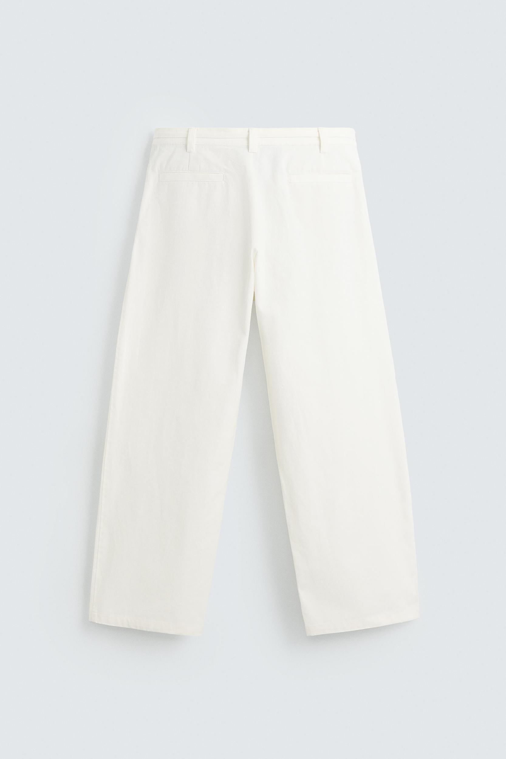 RELAXED FIT PLEATED PANTS Product Image