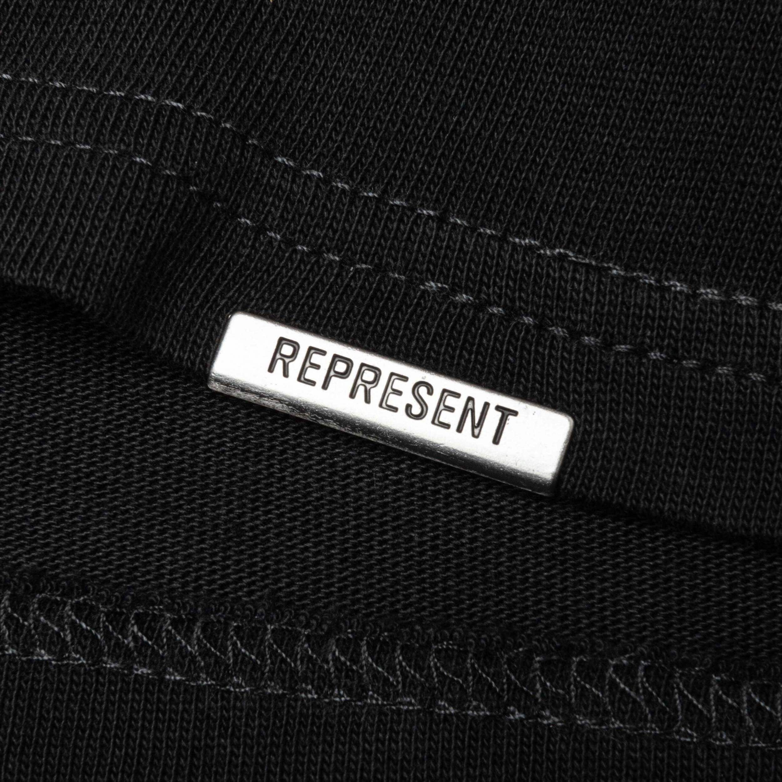 Feature x Represent Champions T-Shirt - Stained Black Male Product Image