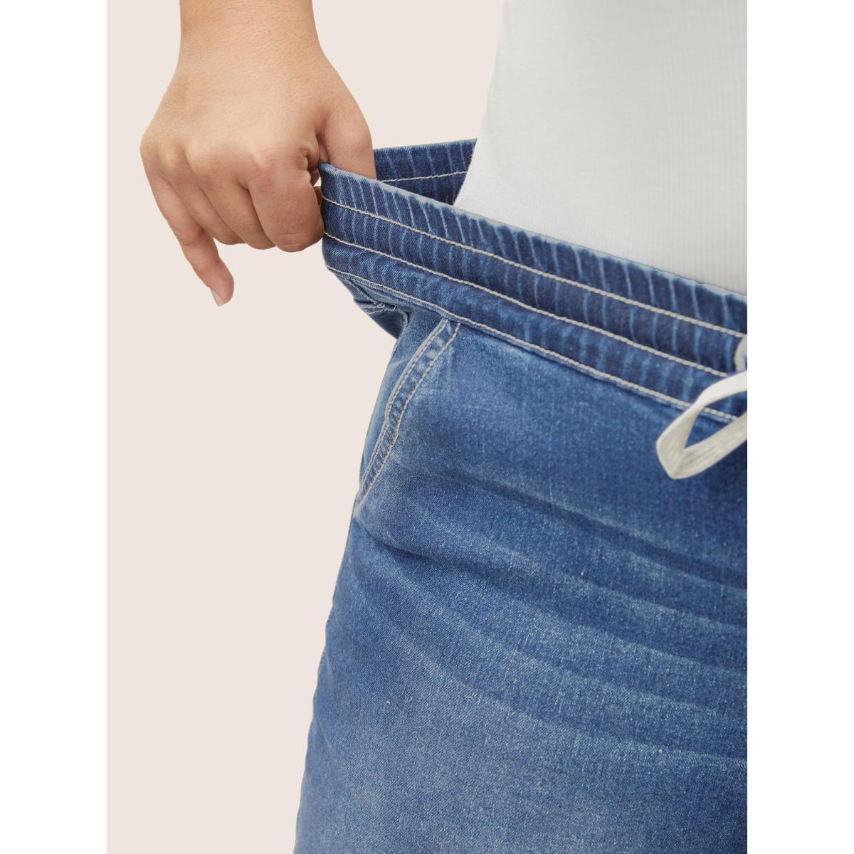 Plus Size Roll Hem Elastic Waist Drawstring Denim Shorts Women Denimlightblue Drawstring High stretch Everyday Slanted pocket Casual Denim Shorts BloomChic 12/L Product Image