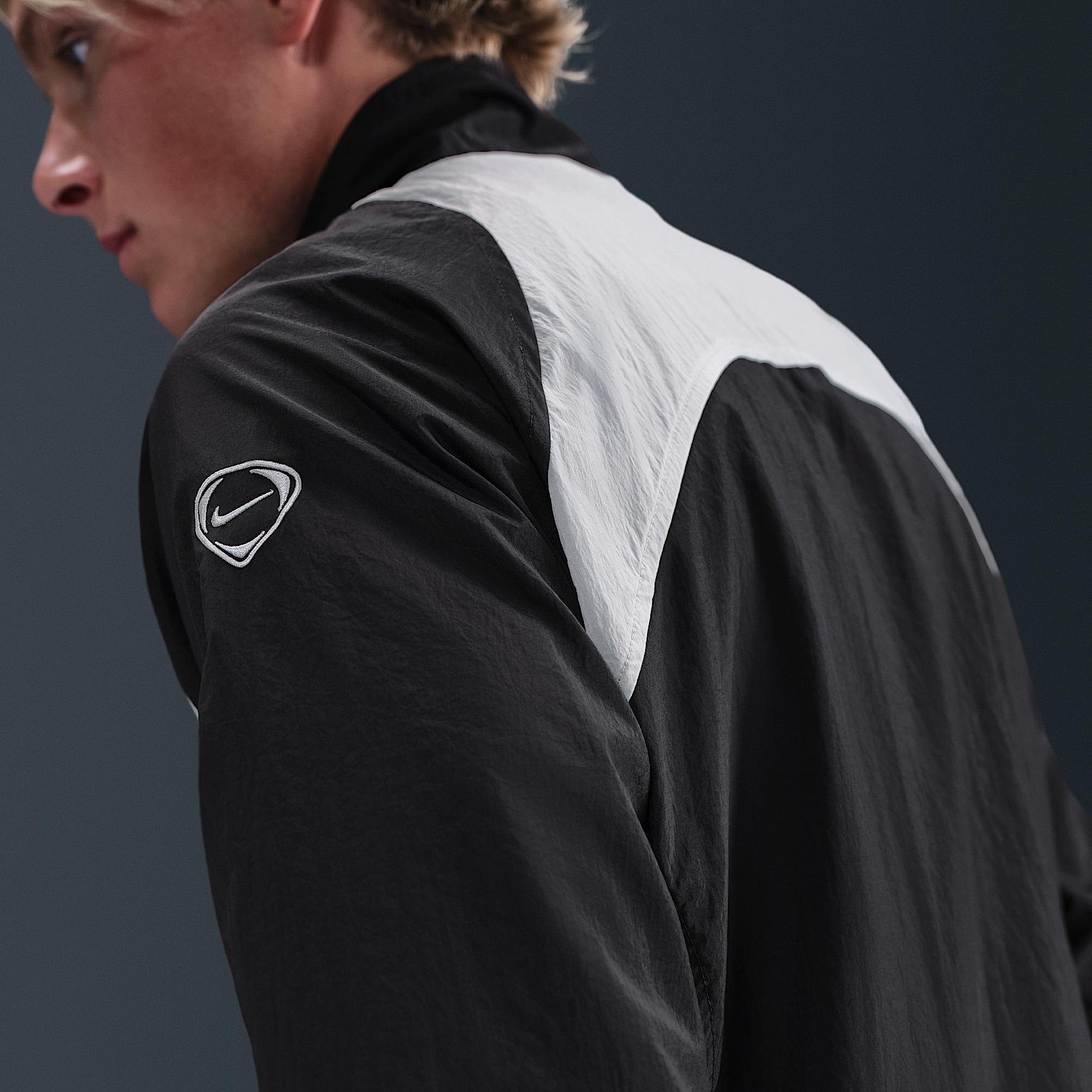 Chelsea FC Men's Nike Soccer Total 90 Soccer Track Jacket Product Image
