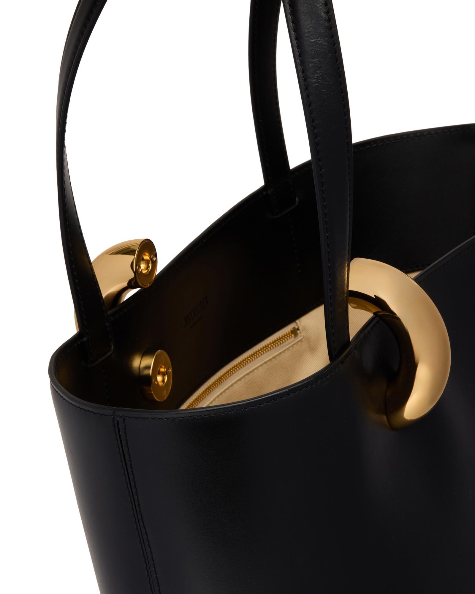JACQUEMUS The Medium Bambola Asymmetric Leather Bucket Bag In Black 990 Product Image