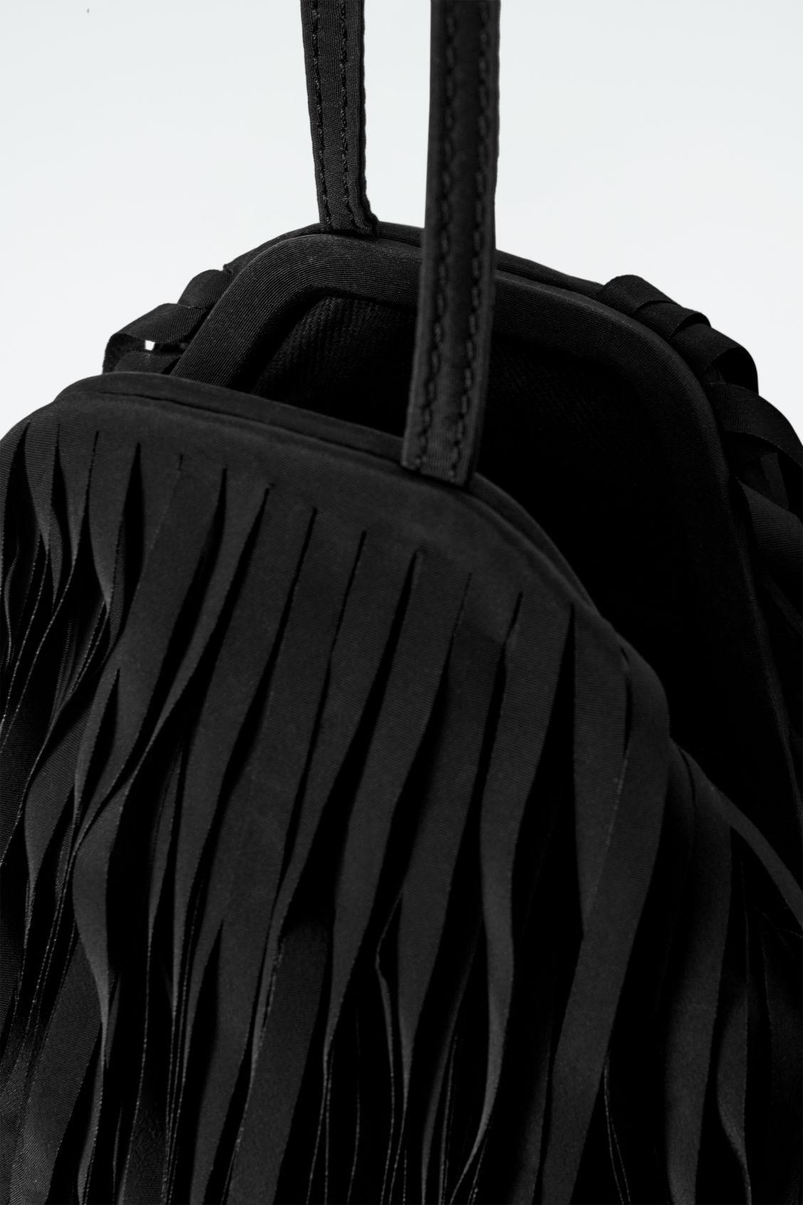 FRINGED CLUTCH Product Image