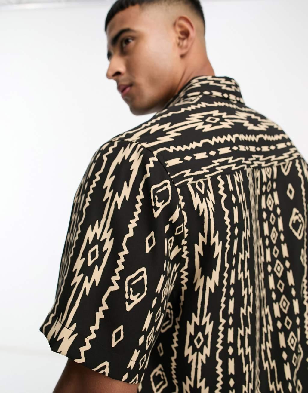 ASOS DESIGN relaxed shirt in black pattern print Product Image